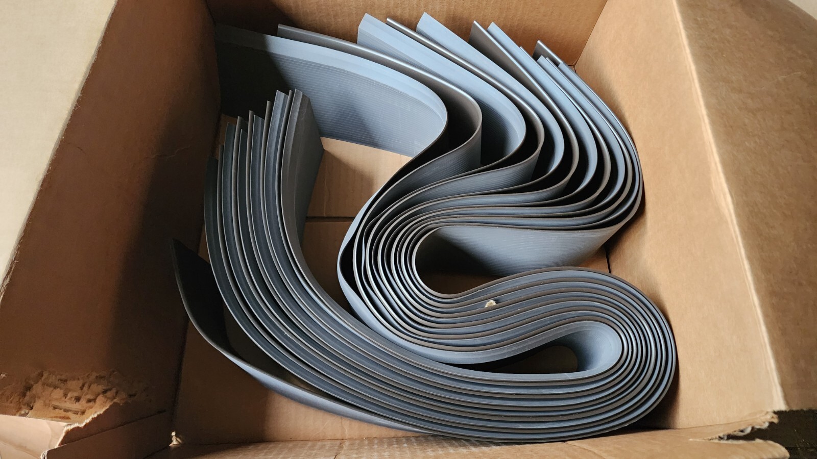 LOT OF 12) 4″ X 4′ VINYL WALL BASE BROWN