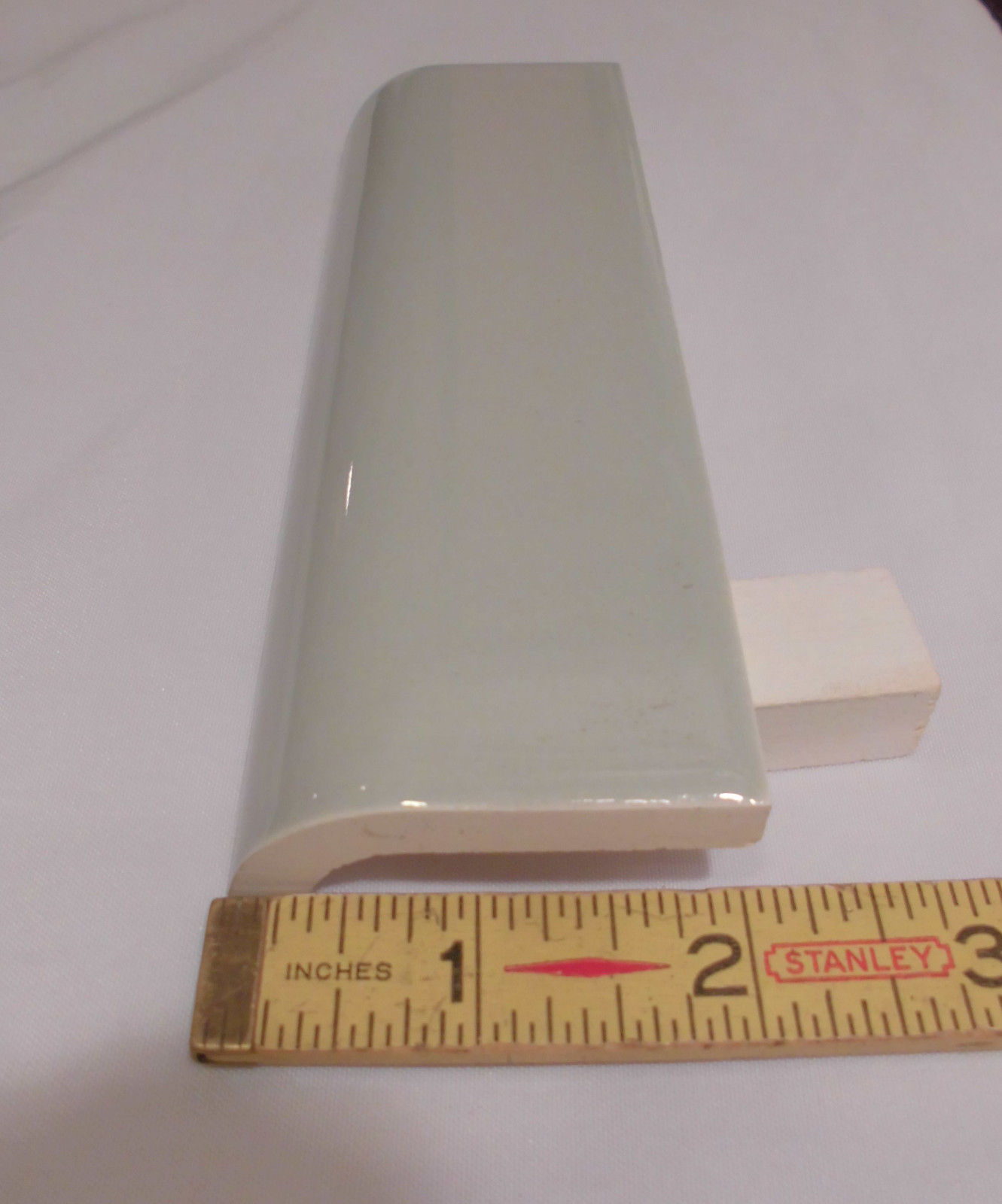 1 pc. Dove Gray: Glossy Ceramic Radius Bullnose Tile by Wenczel Co. 2″ X 6-1/4″