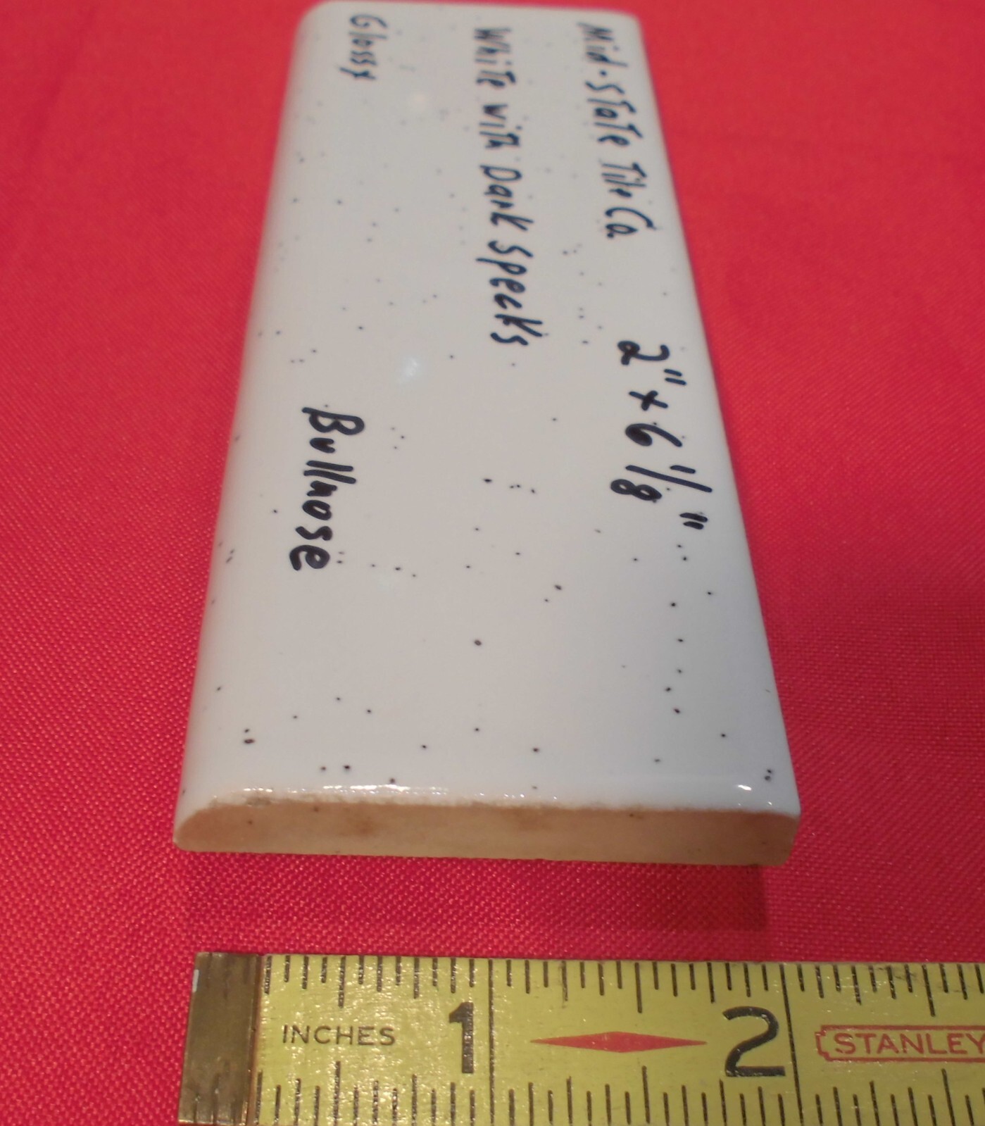1 pc. White + Dark Specks: 2” X 6” Surface Bullnose Ceramic Tile by MID-STATE