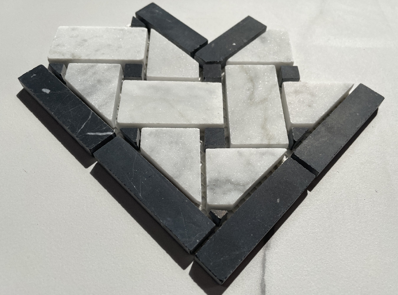 C651CXH Carrara Venato Carrera Marble 4×4 Basketweave Mosaic Corner Honed