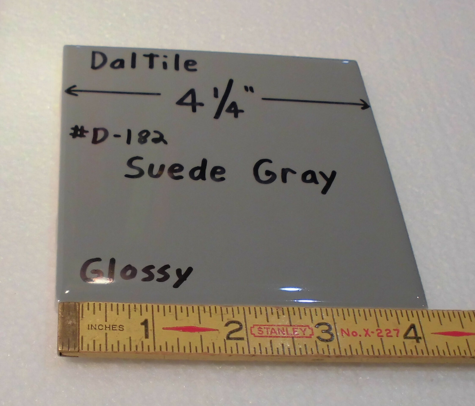 1 pc. Suede Gray; Glossy Ceramic Tile by Daltile; 4-1/4″ New Stock, darker gray