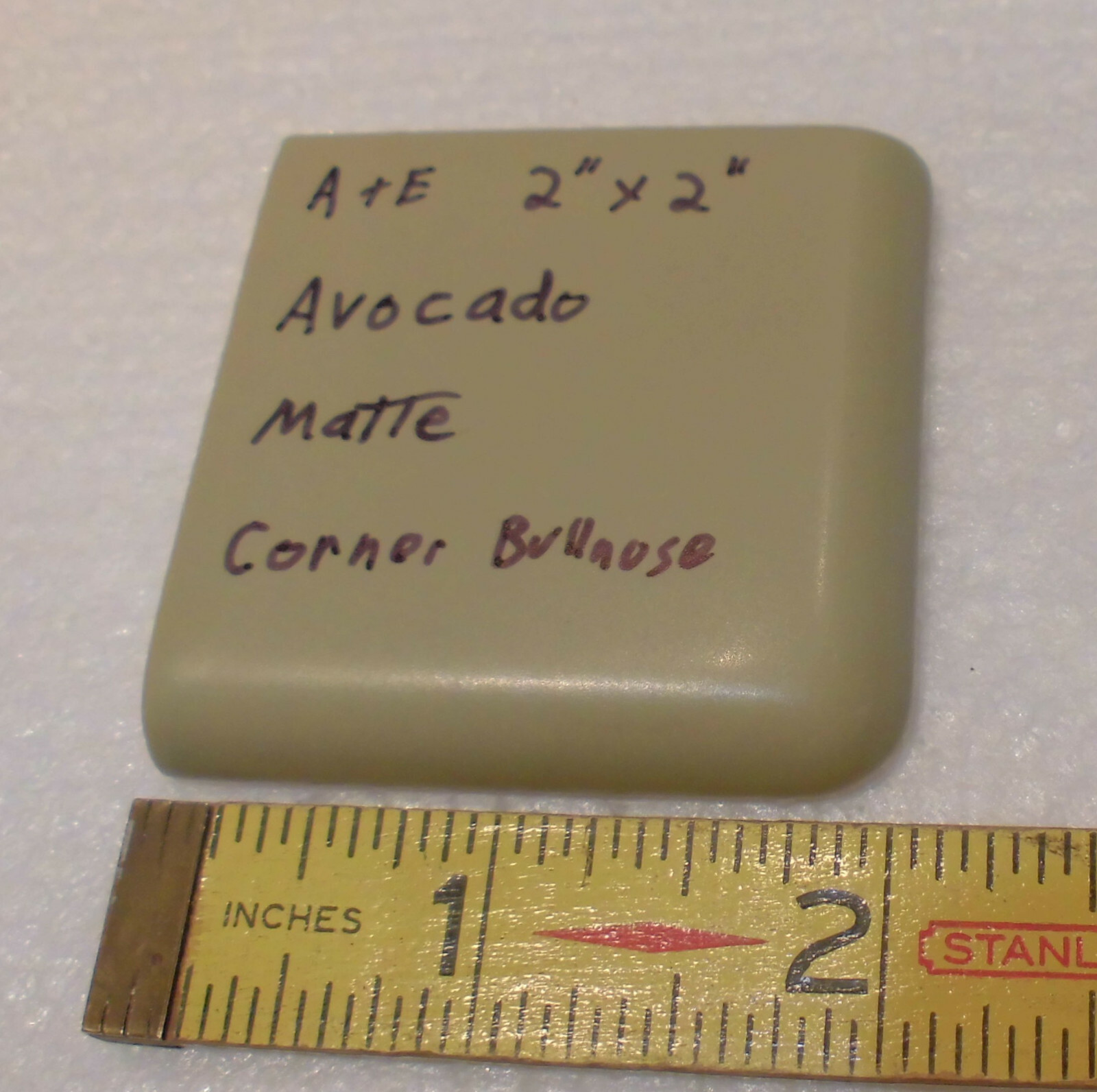 1 pc. Avocado Green 2″ X 2″ X 5/16″ Ceramic Surface Bullnose Corner Tile; Matte
