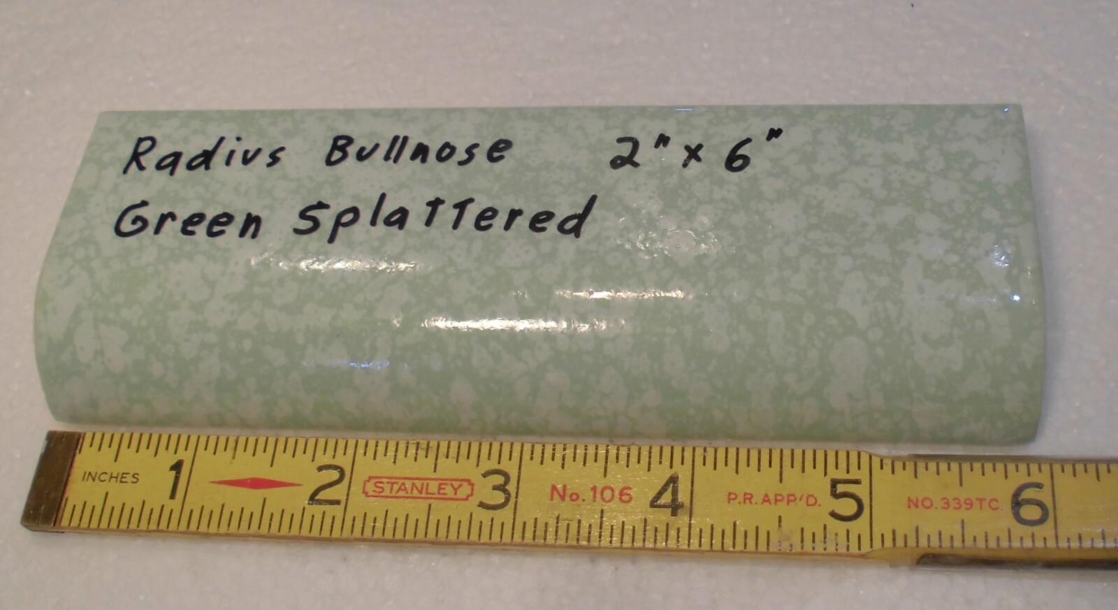 1 pc. “Pale Green Splattered” Ceramic Tile: 2″ X 6″ Glossy Radius Bullnose: NOS