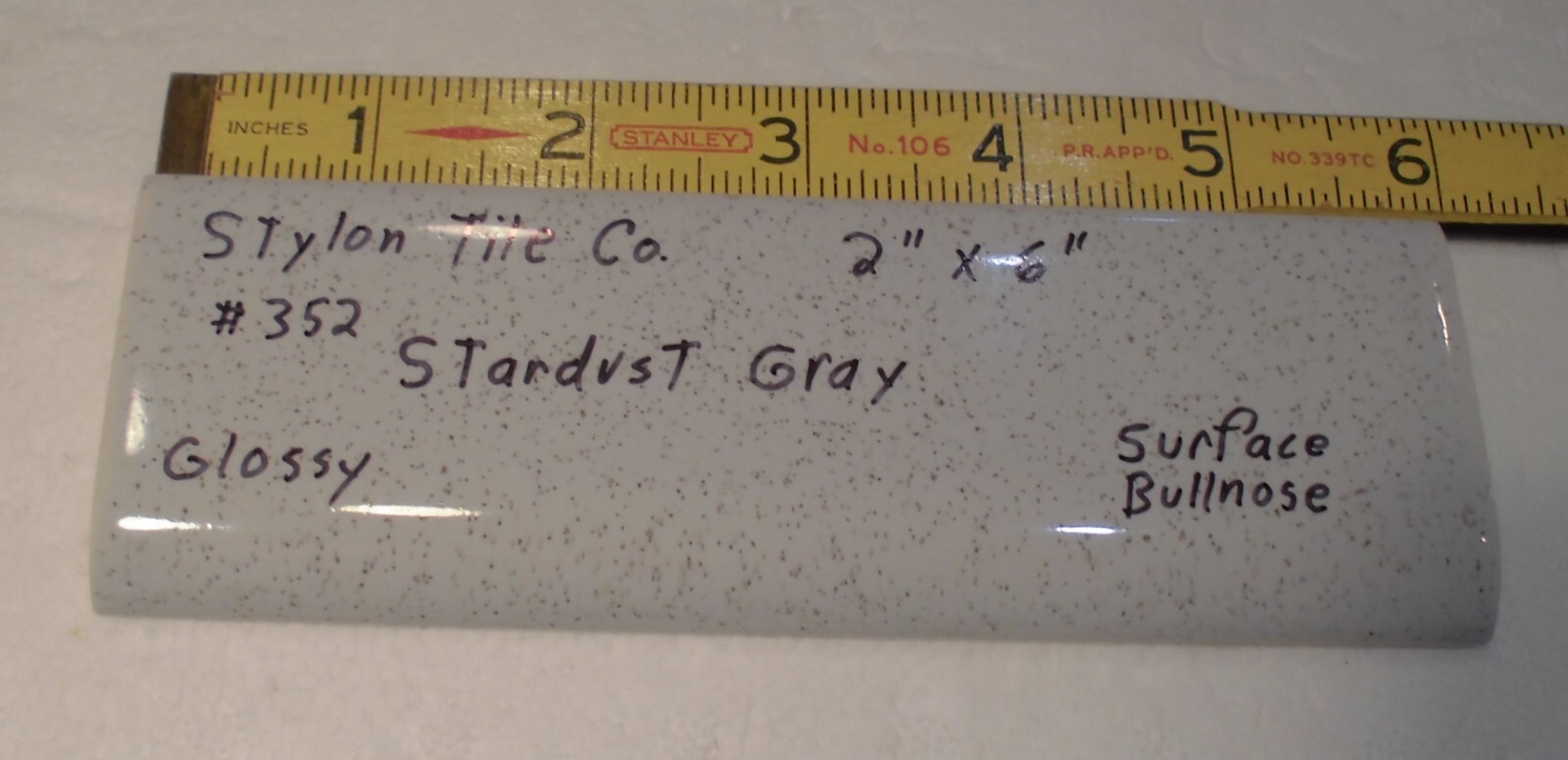 1 pc. Stardust Gray: 2” X 6” Speckled Glossy Bullnose Ceramic Tile, Stylon, Used