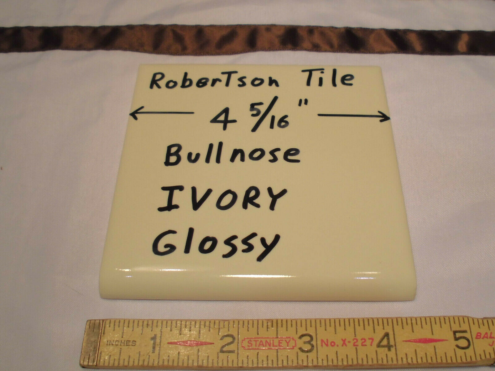 1 pc. Ivory- Light Yellow: 4-3/8″ Glossy Ceramic Bullnose by Robertson Tile Co.