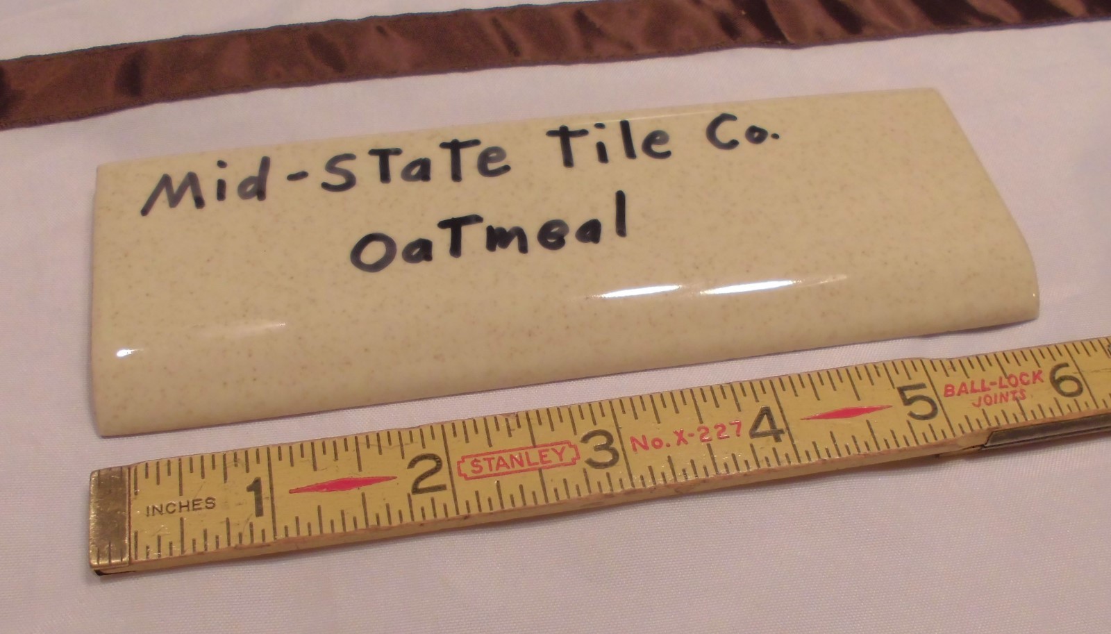 1 pc. Glossy *Oatmeal: 2” X 6-1/8” Bullnose Surface Ceramic Tile by MID-STATE