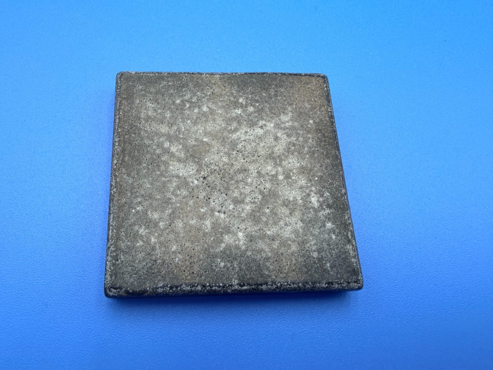 New Questech 2×2 Fleur-de-lis Insert Accent Composite Tile w/ Aged Iron Finish