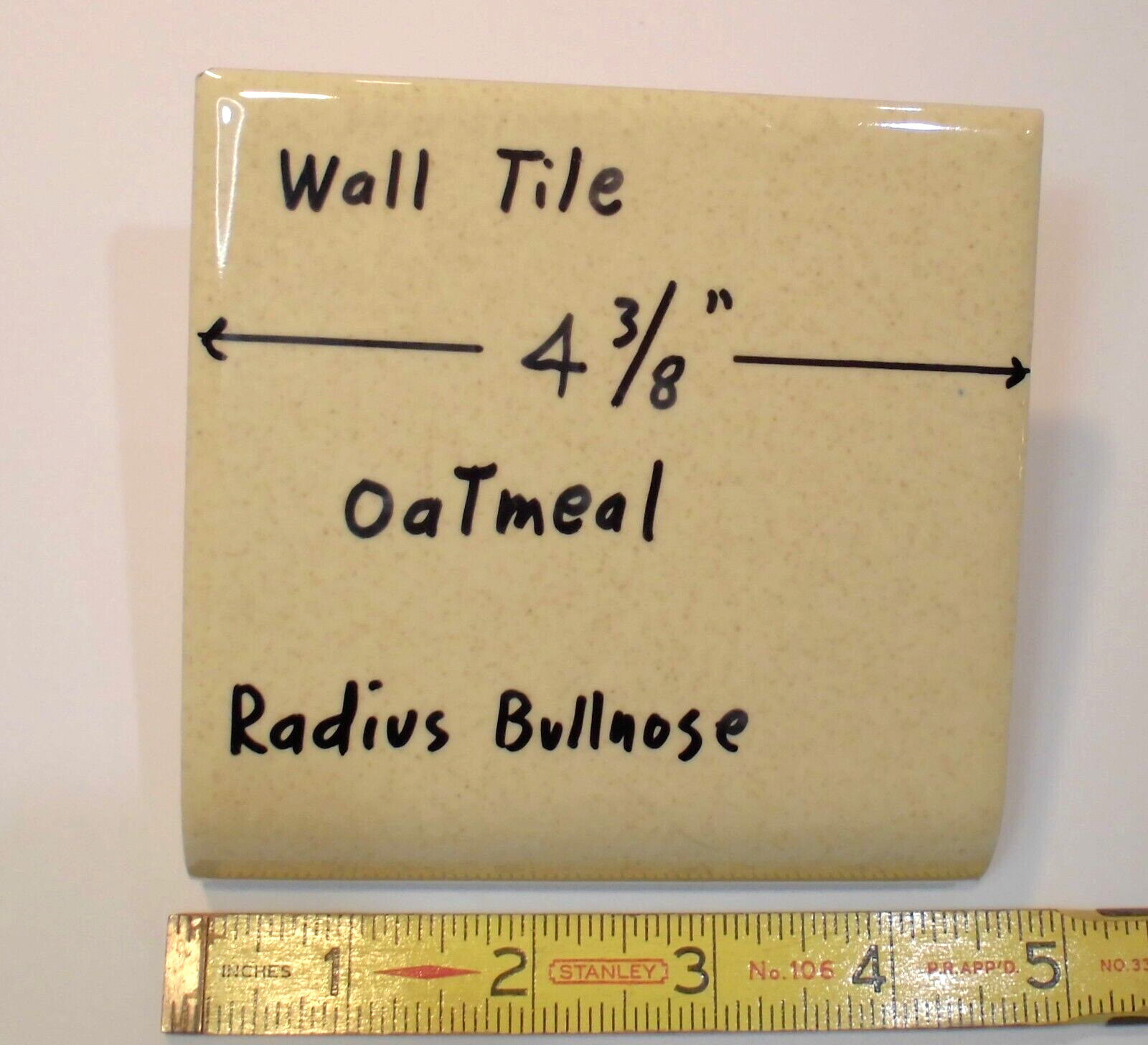 1 pc. Oatmeal: Glossy Ceramic Radius Bullnose tile 4-3/8″ Speckled Beige Defects