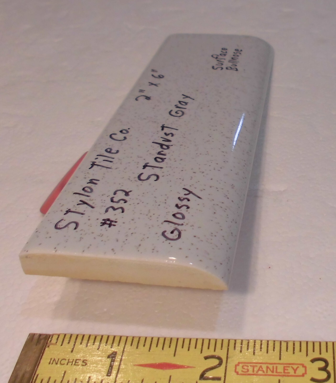 1 pc. Stardust Gray: 2” X 6” Speckled Glossy Bullnose Ceramic Tile, Stylon, Used