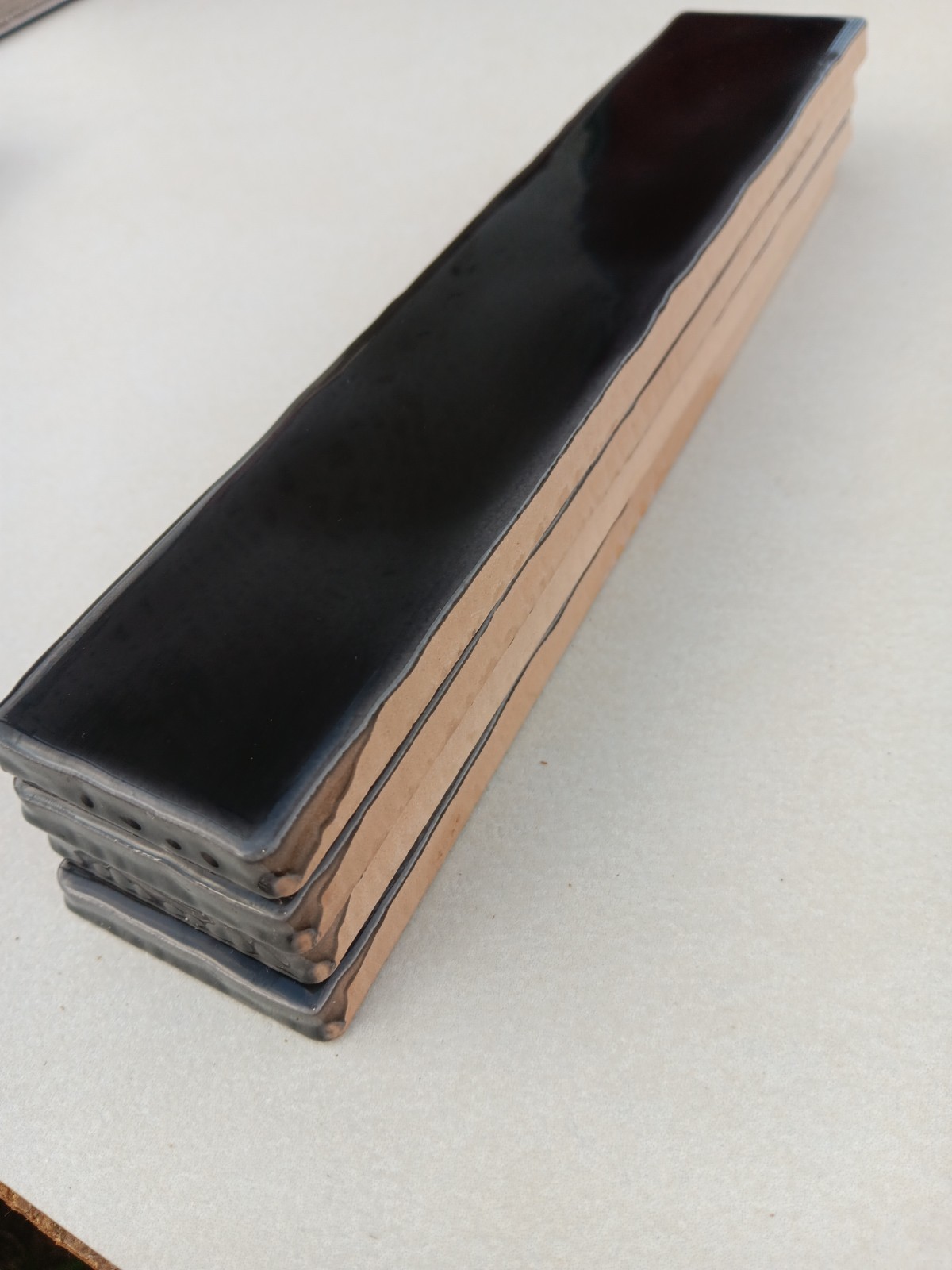 20 Tiles (2.5 ft²) – Glossy Charcoal Black 2″ x 8″ Ceramic Subway Tile