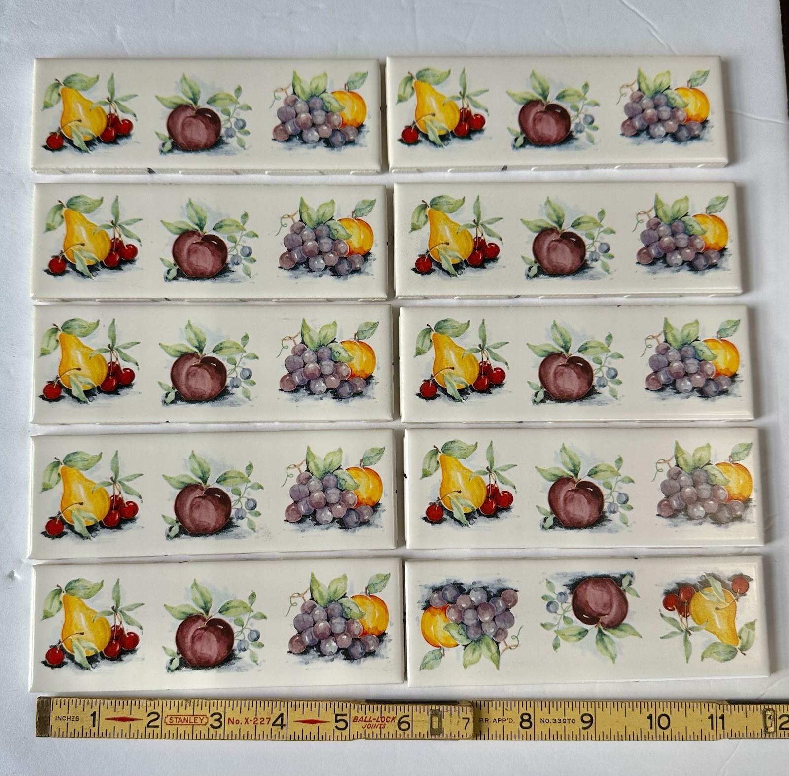 10 pieces: 2″ X 6″ Decorative Ceramic Listello Tile, Country Fruit, made USA