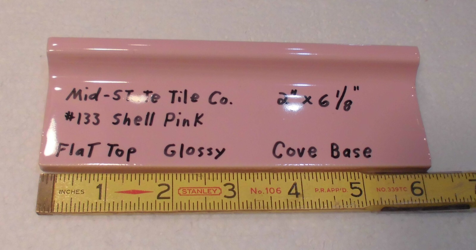 1 pc. Shell Pink 2” X 6-1/8” Glossy Ceramic Cove Base Tile, Flat Top, Mid-State