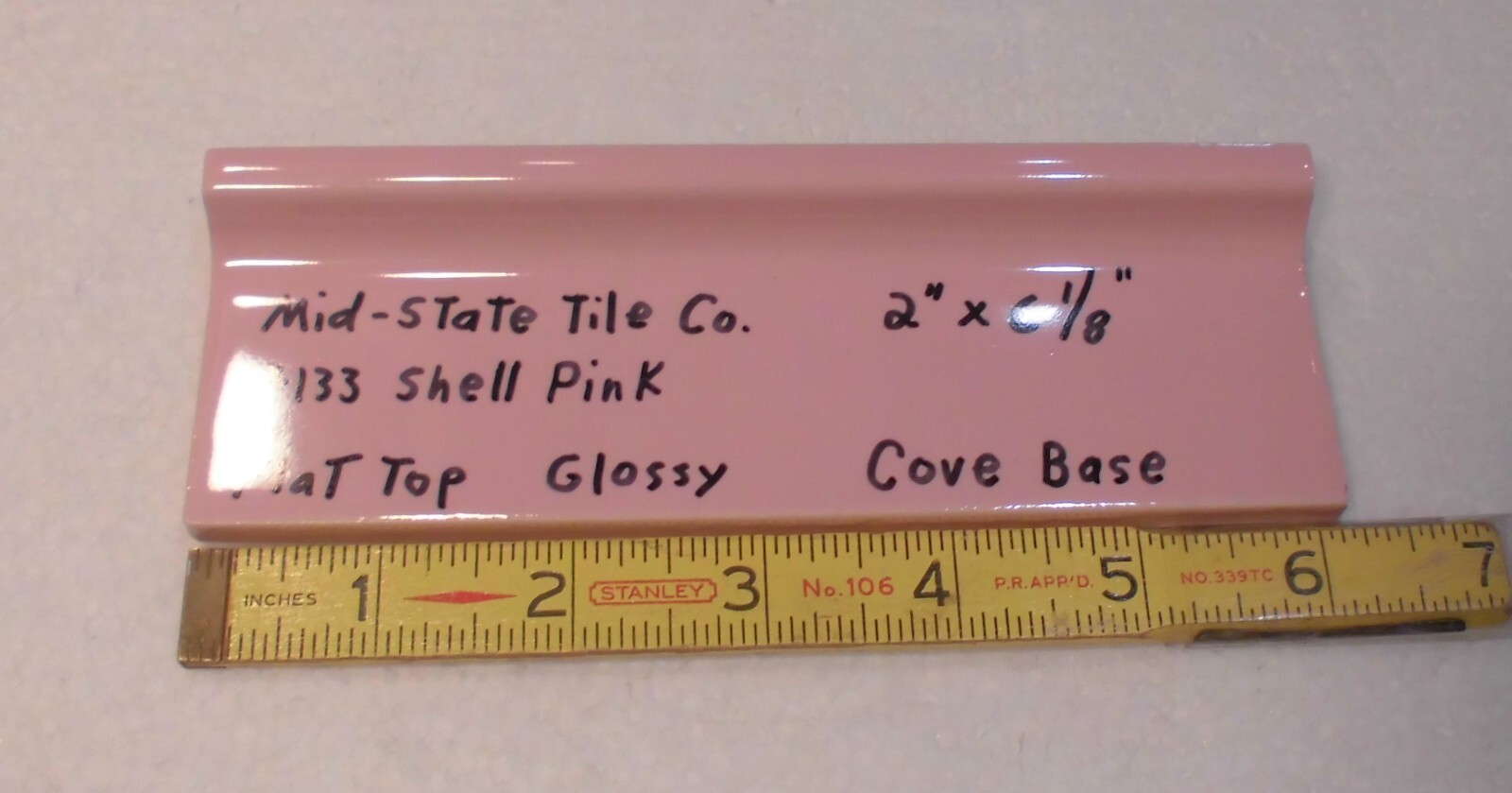 1 pc. Shell Pink 2” X 6-1/8” Glossy Ceramic Cove Base Tile, Flat Top, Mid-State