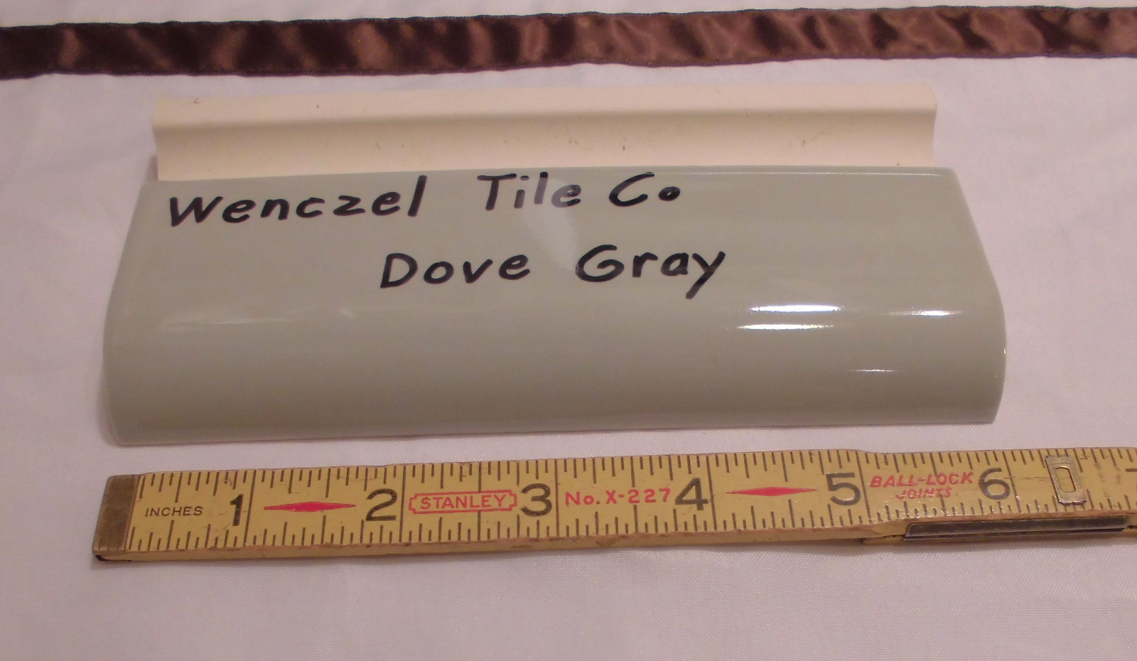 1 pc. Dove Gray: Glossy Ceramic Radius Bullnose Tile by Wenczel Co. 2″ X 6-1/4″