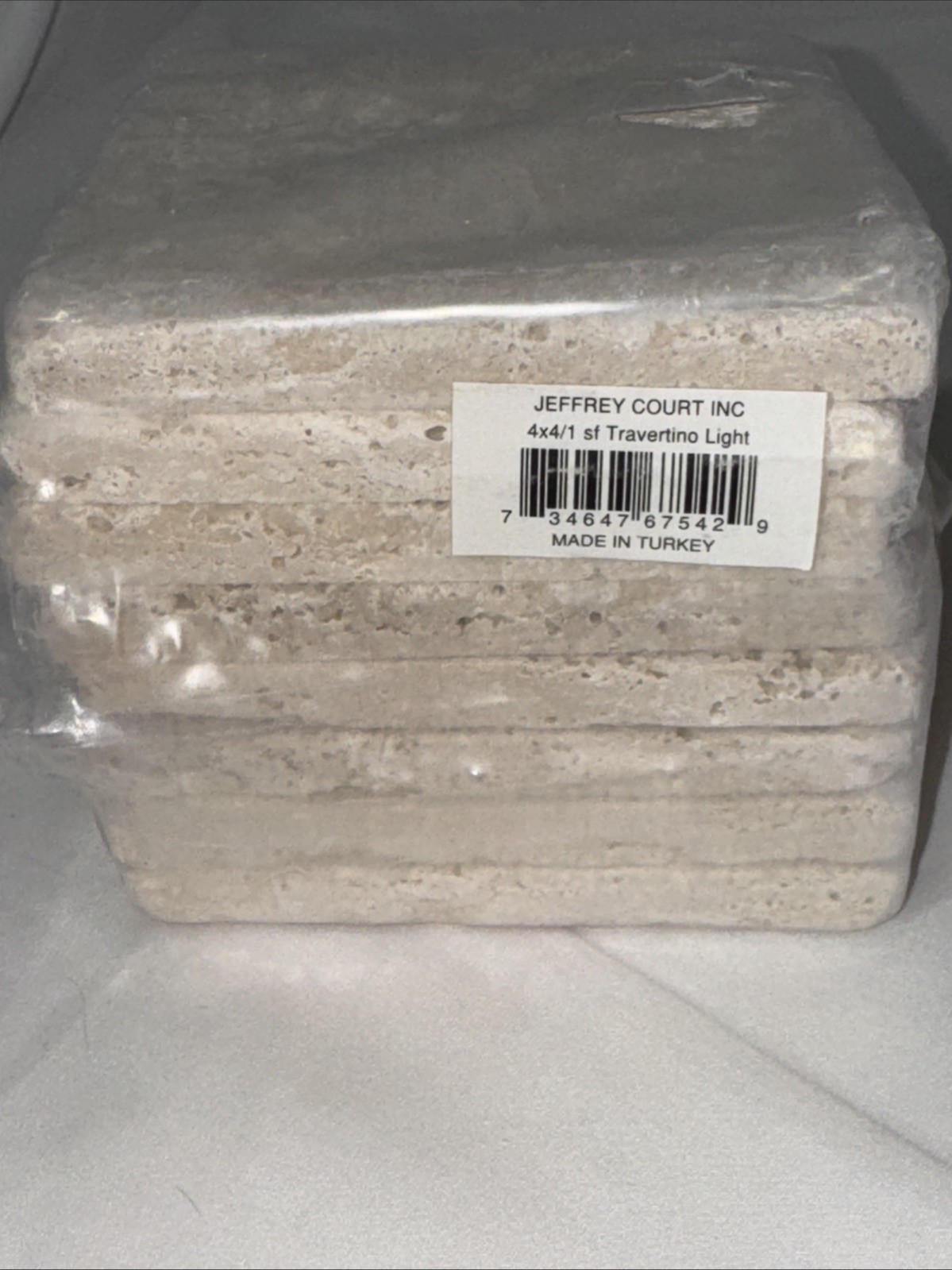 Jeffery Court Inc 4 X 4 Travertino Light Tile. 1 sf