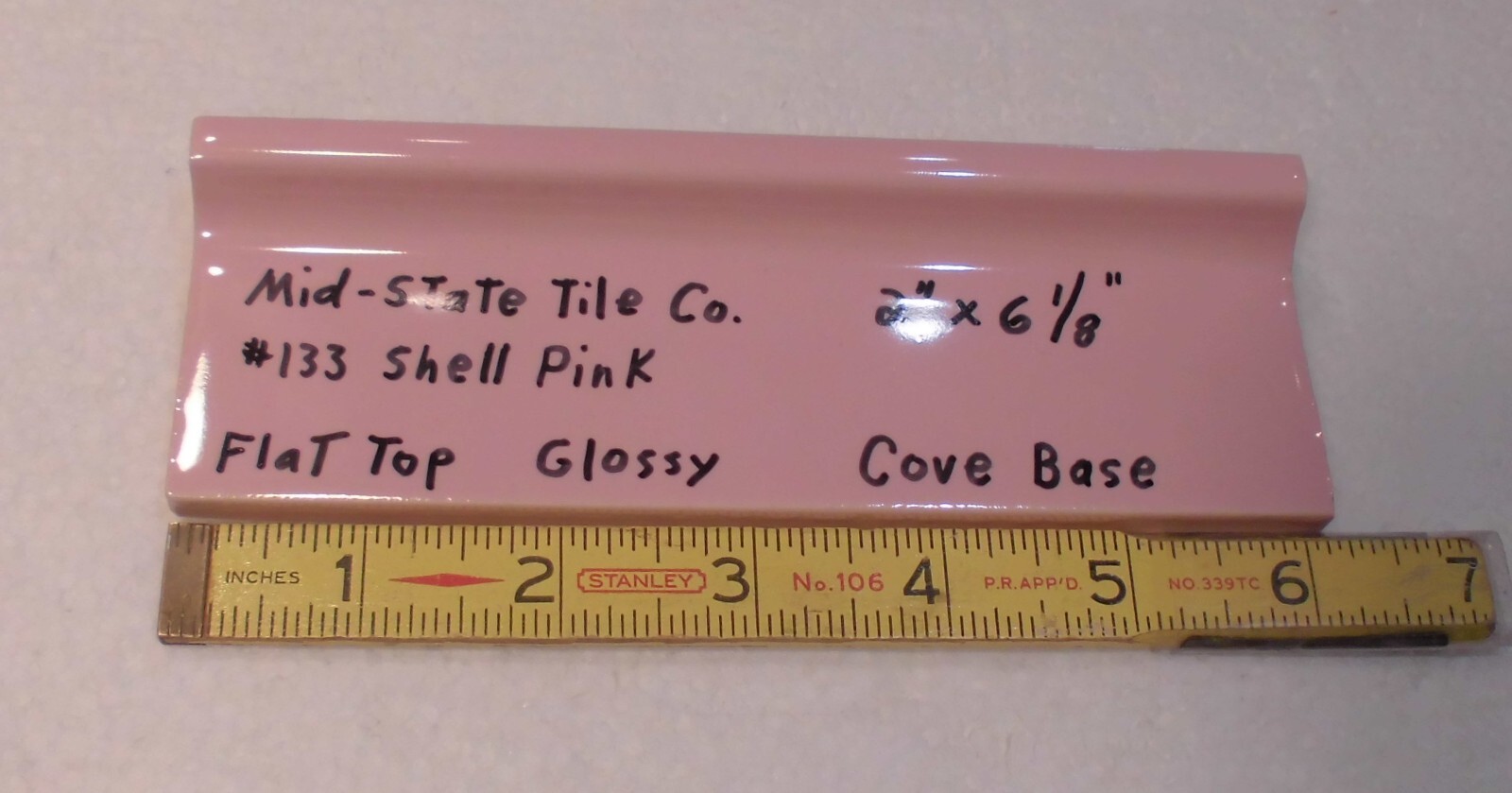 1 pc. Shell Pink 2” X 6-1/8” Glossy Ceramic Cove Base Tile, Flat Top, Mid-State