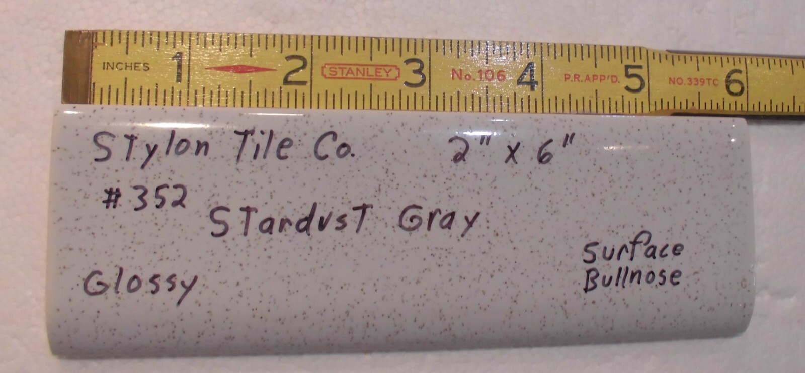 1 pc. Stardust Gray: 2” X 6” Speckled Glossy Bullnose Ceramic Tile, Stylon, Used