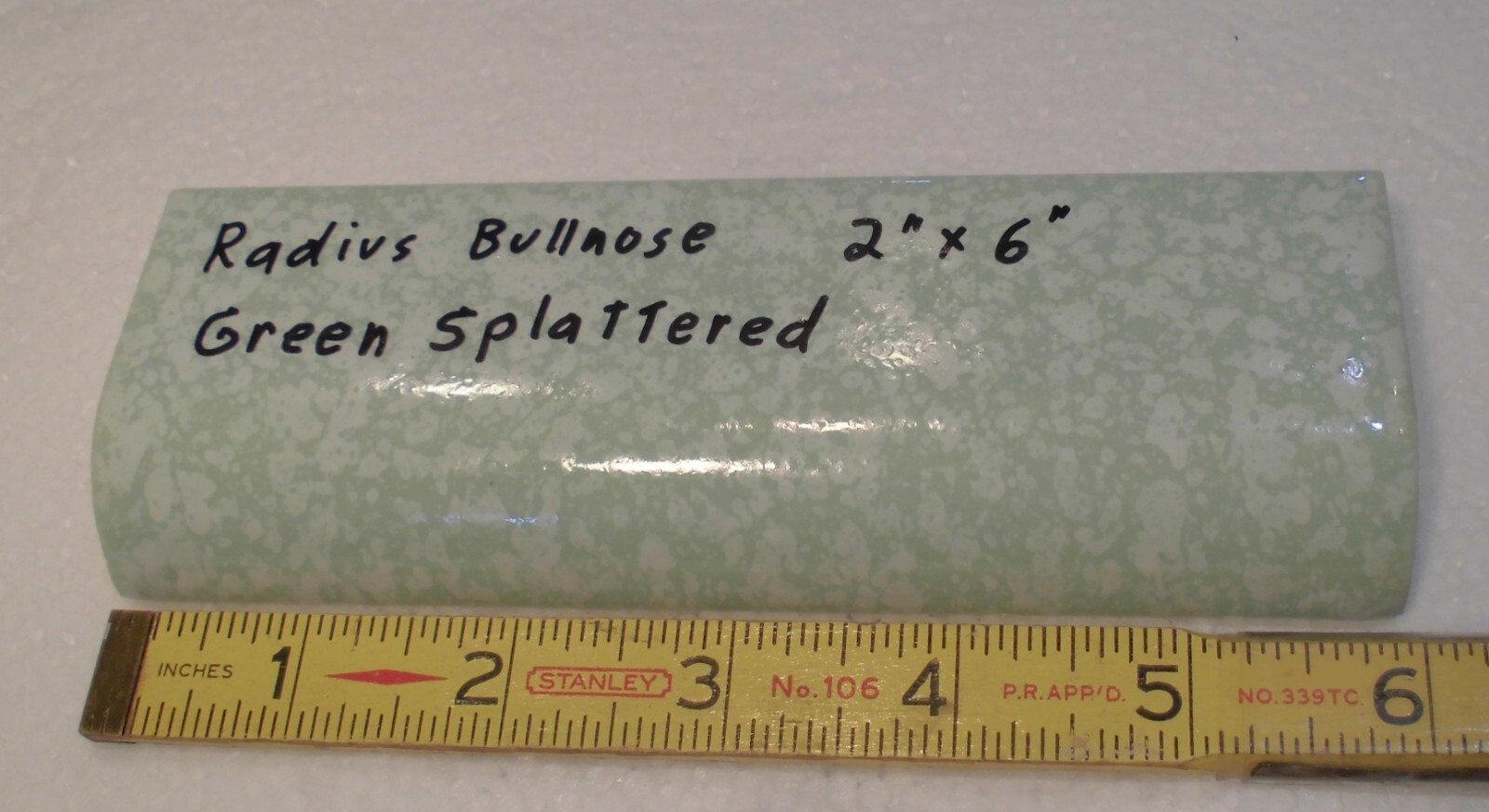 1 pc. “Pale Green Splattered” Ceramic Tile: 2″ X 6″ Glossy Radius Bullnose: NOS