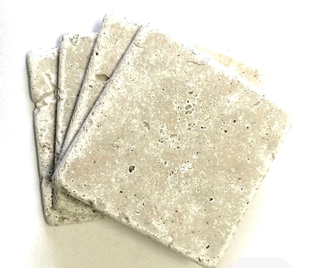 Light 4×4 Tumbled Antiqued Travertine Tile Backsplash.