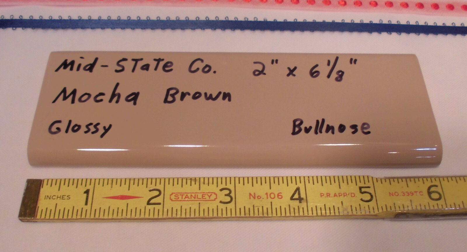 1 pc. Glossy *Mocha Brown* 2” X 6” Bullnose Surface Ceramic Tile by MID-STATE