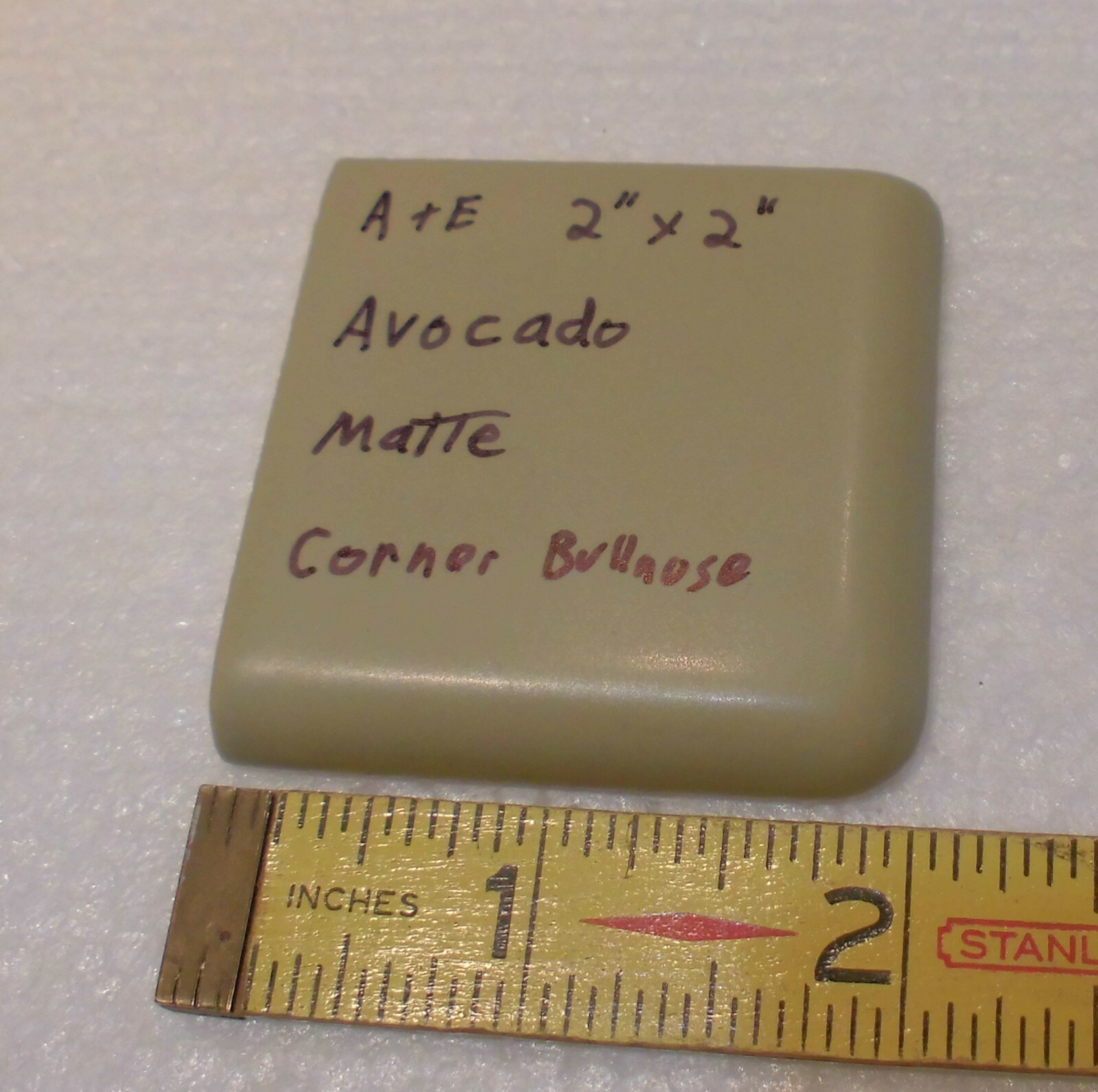 1 pc. Avocado Green 2″ X 2″ X 5/16″ Ceramic Surface Bullnose Corner Tile; Matte