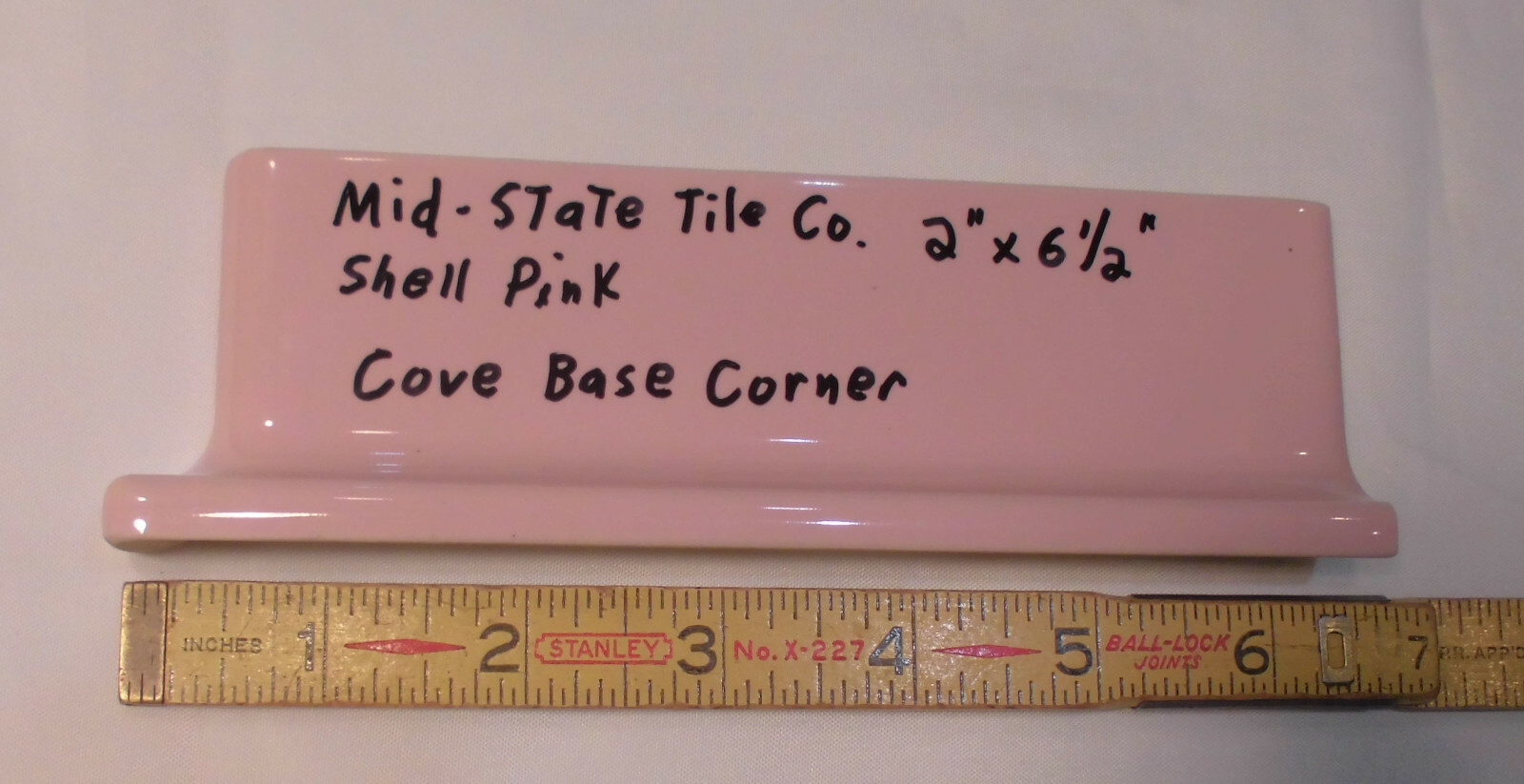 1 pc. Glossy Shell Pink 2” X 6-1/2” Ceramic Cove Base; Flat Tile; Flat Top, L