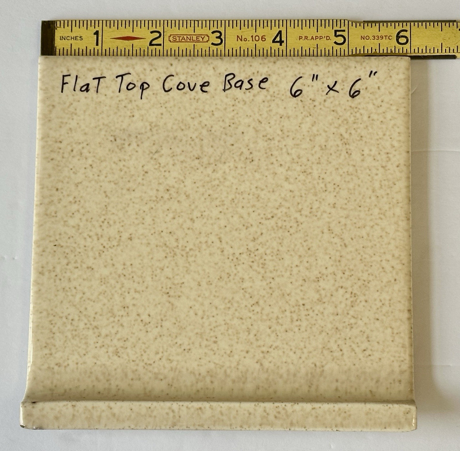 1 pc. Oatmeal Speckled Color: 6” X 6” Glossy Ceramic Cove Base Tile