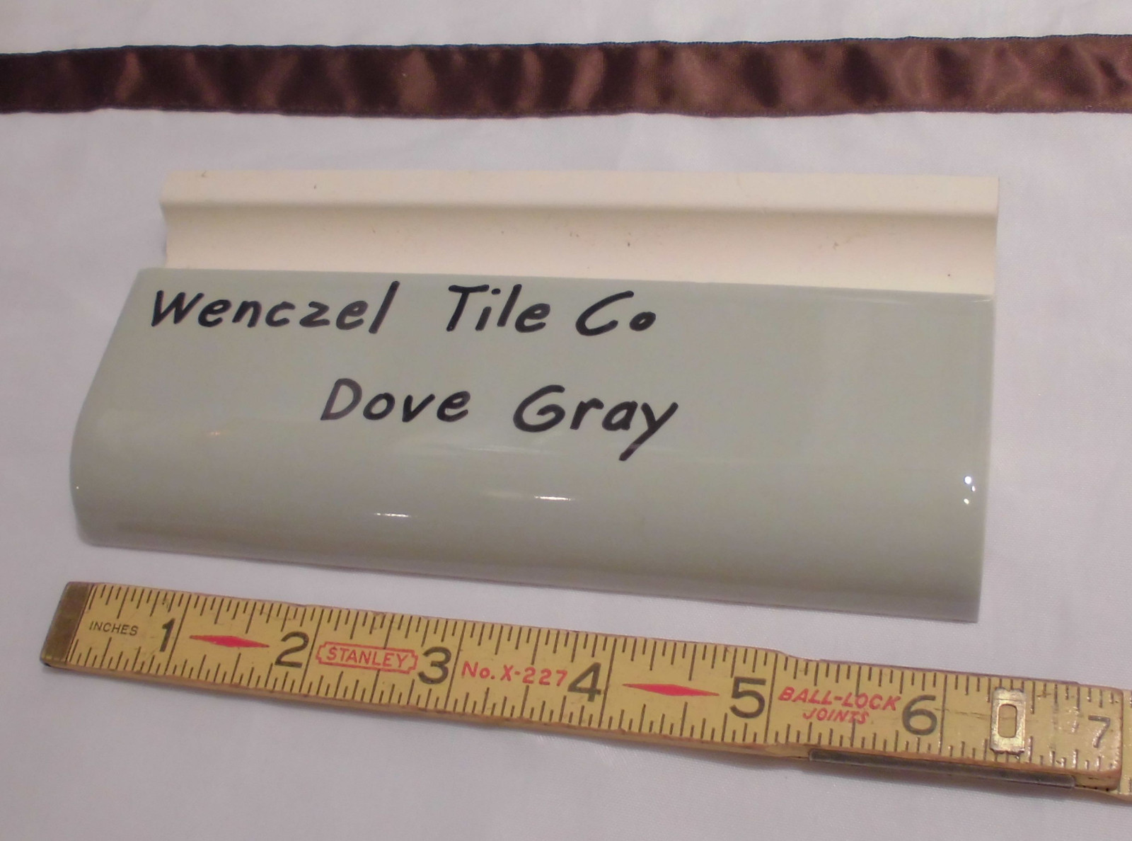1 pc. Dove Gray: Glossy Ceramic Radius Bullnose Tile by Wenczel Co. 2″ X 6-1/4″