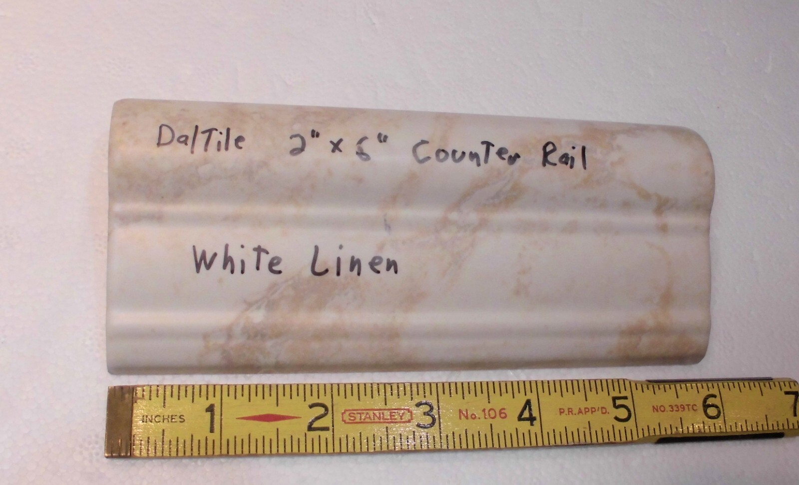 1 pc. Daltile: White Linen + Brown: V Cap Ceramic Trim Tile: Countertop-Edging