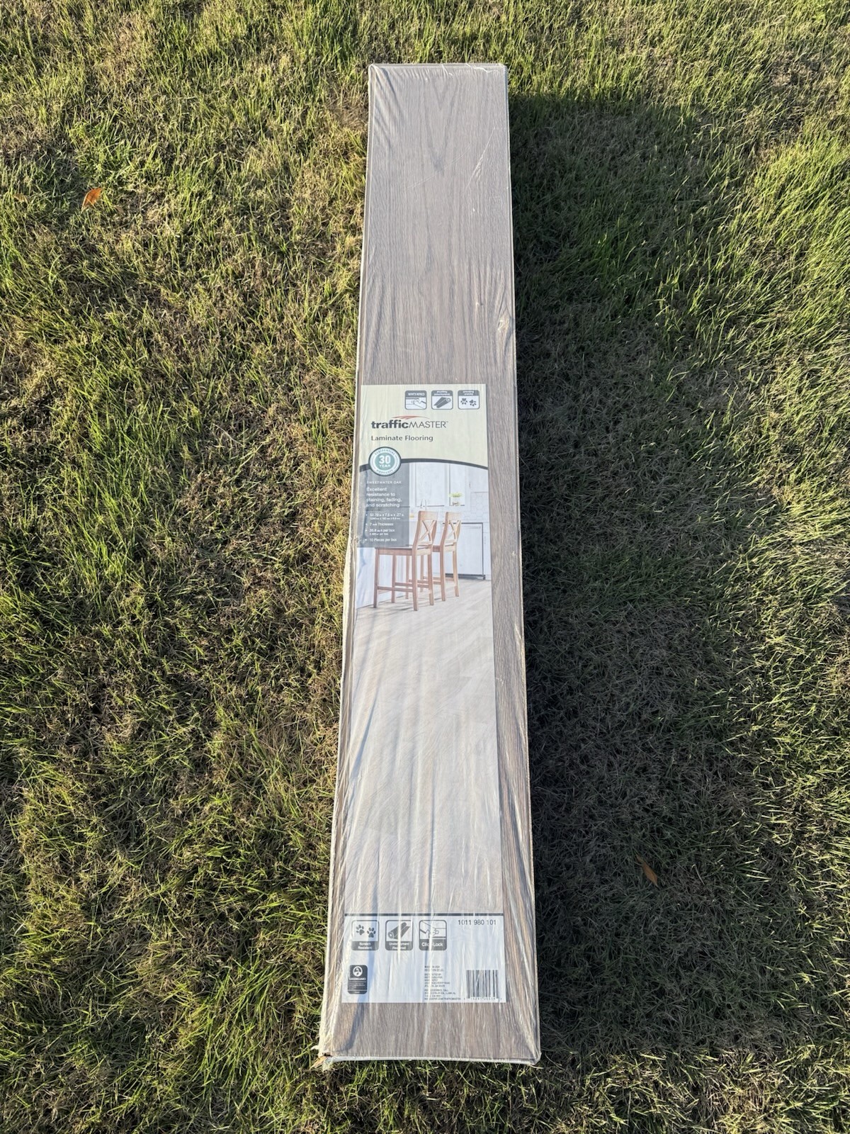 TrafficMaster Sweetwater Oak 7 mm x 7.6 in. W Laminate Wood Flooring (26.8 sq.f
