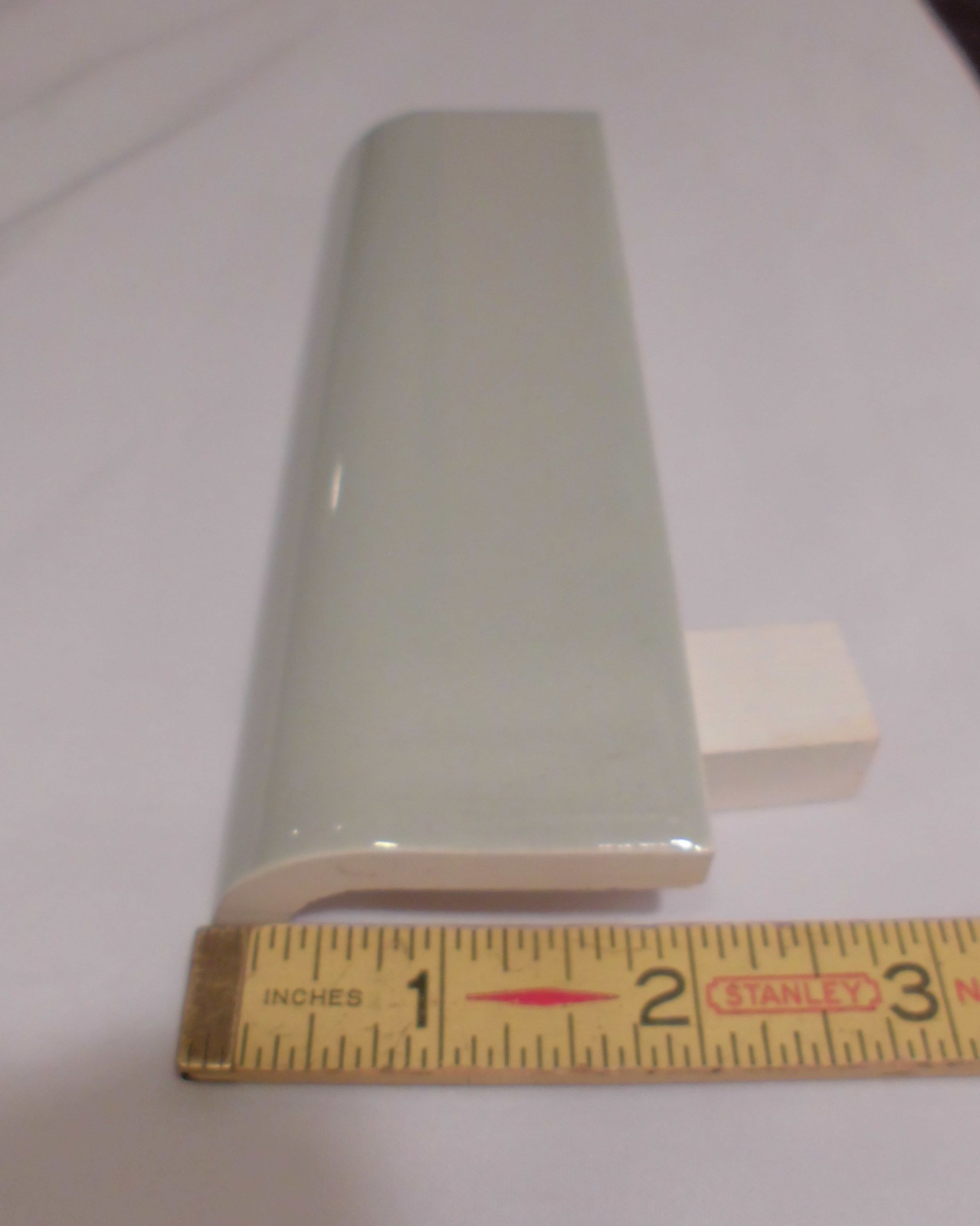 1 pc. Dove Gray: Glossy Ceramic Radius Bullnose Tile by Wenczel Co. 2″ X 6-1/4″