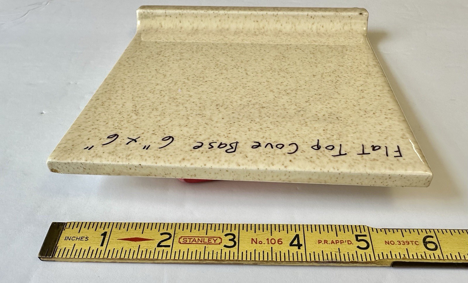 1 pc. Oatmeal Speckled Color: 6” X 6” Glossy Ceramic Cove Base Tile