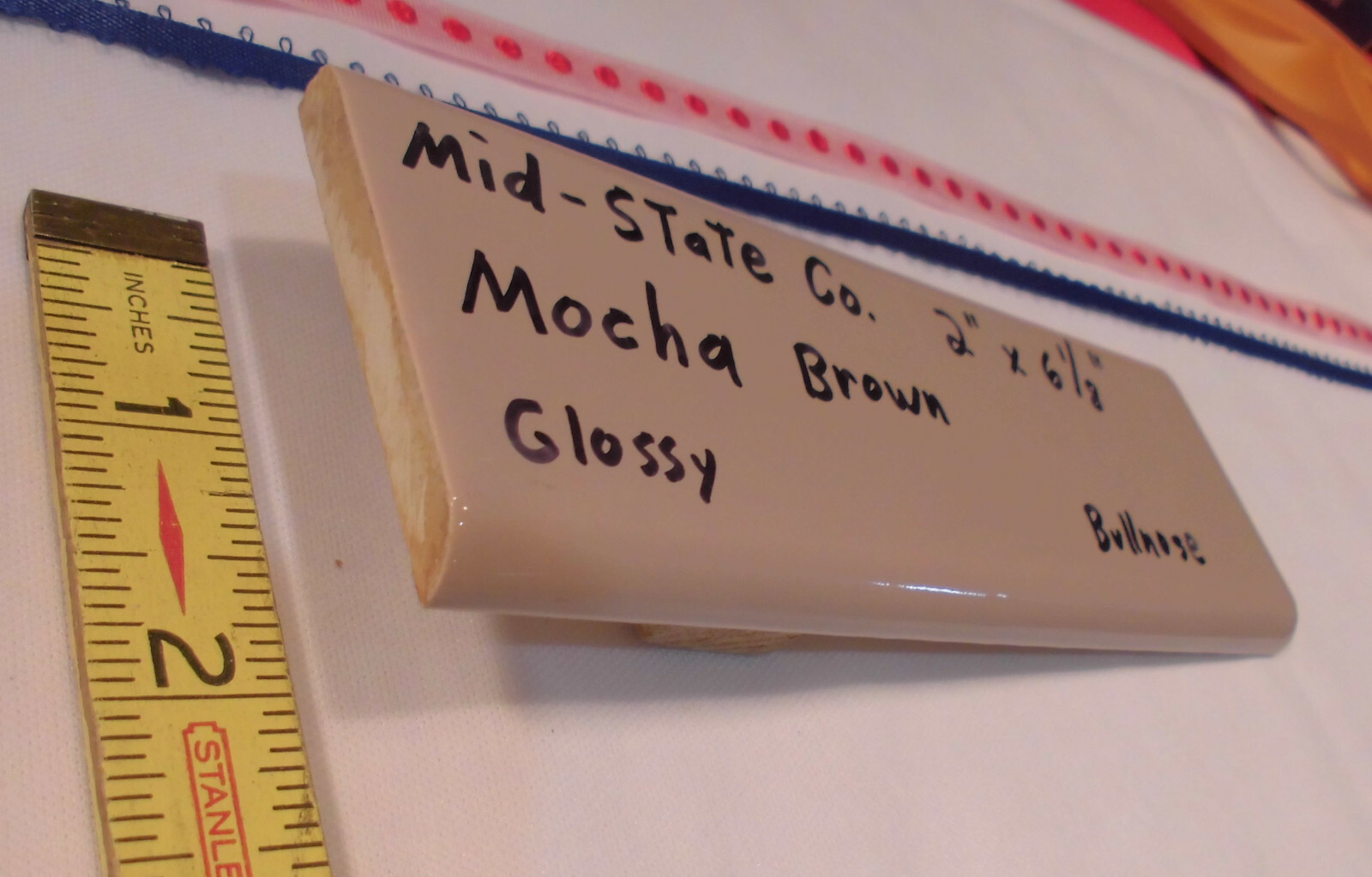 1 pc. Glossy *Mocha Brown* 2” X 6” Bullnose Surface Ceramic Tile by MID-STATE