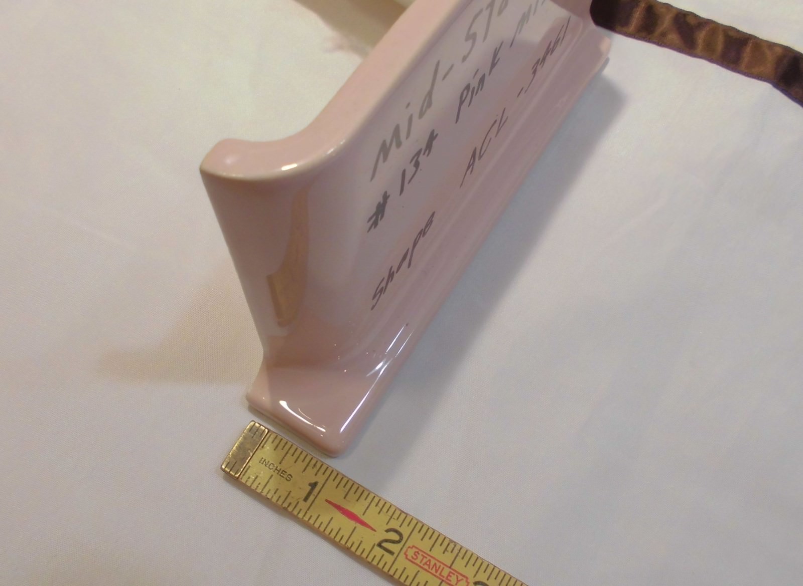 1 pc. Glossy *Pink Mist* 4” X 6” Ceramic Cove Base Outside Corner Tile-stack top