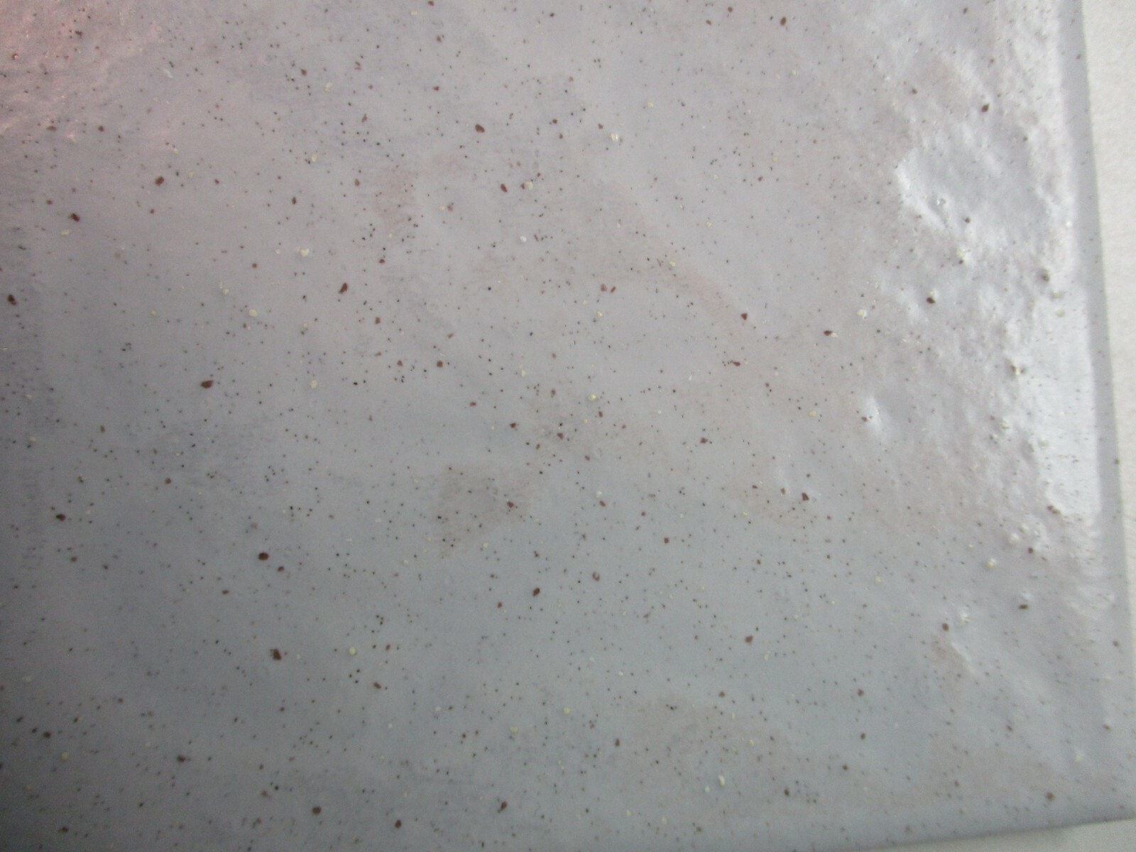 1 Tile interceramic 4-1/4″sq Satin Brown Speckles on Pale Gray Wrinkled Wall MCM