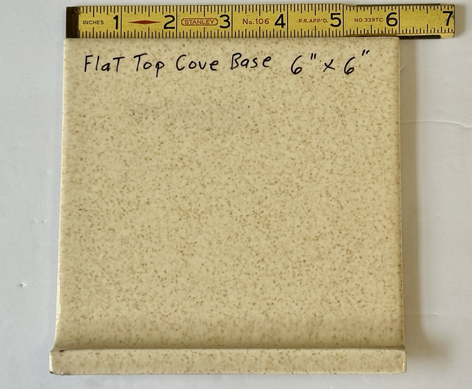 1 pc. Oatmeal Speckled Color: 6” X 6” Glossy Ceramic Cove Base Tile