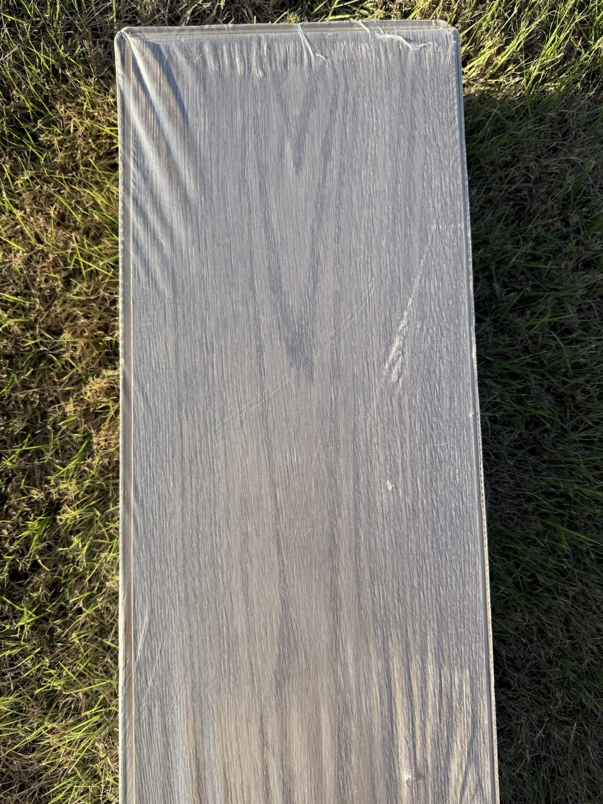 TrafficMaster Sweetwater Oak 7 mm x 7.6 in. W Laminate Wood Flooring (26.8 sq.f