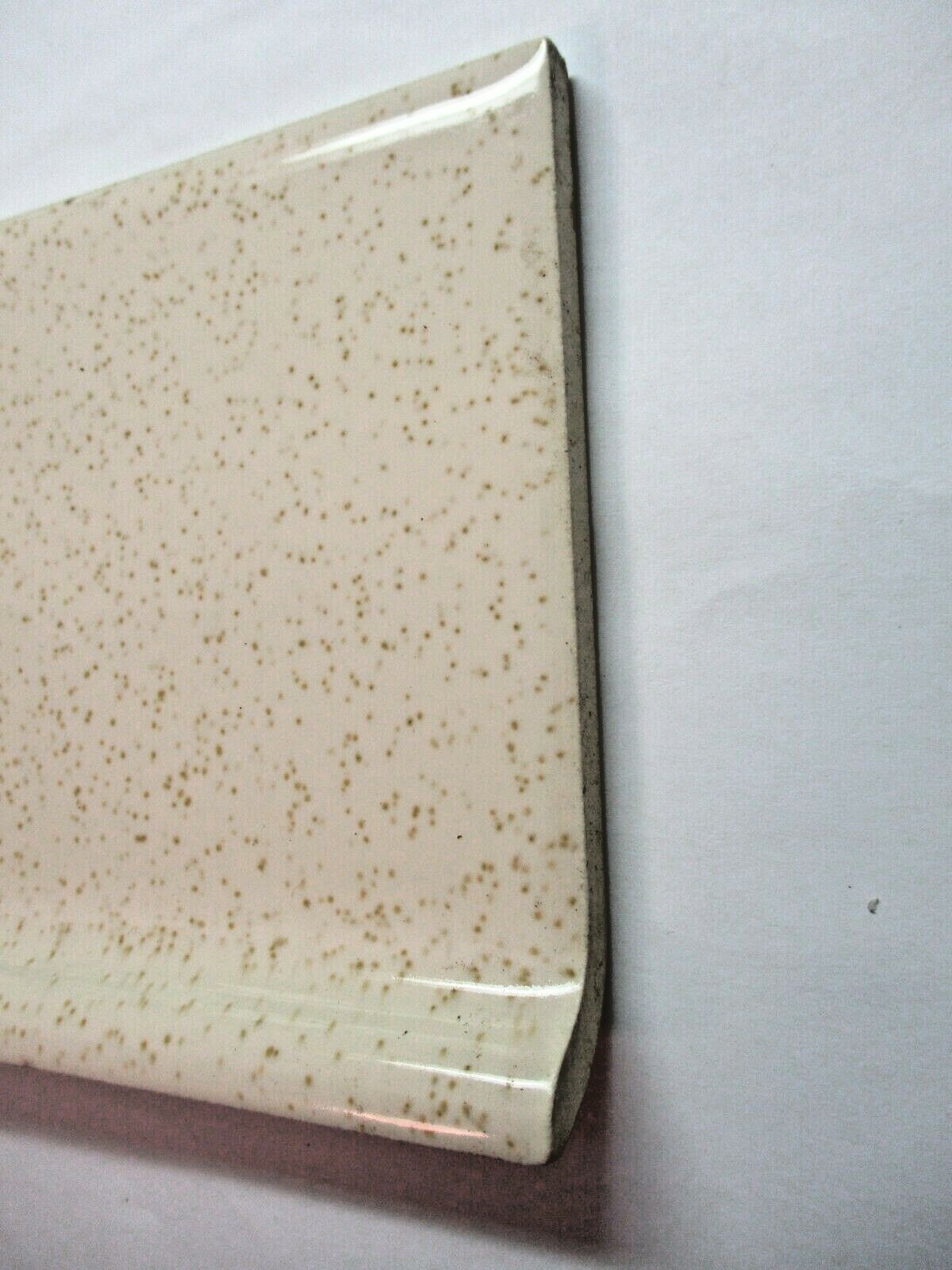 1 Tile Wheeling US 4-3/8″ Gloss Oatmeal Brown Specks on Beige Cove Base Wall MCM