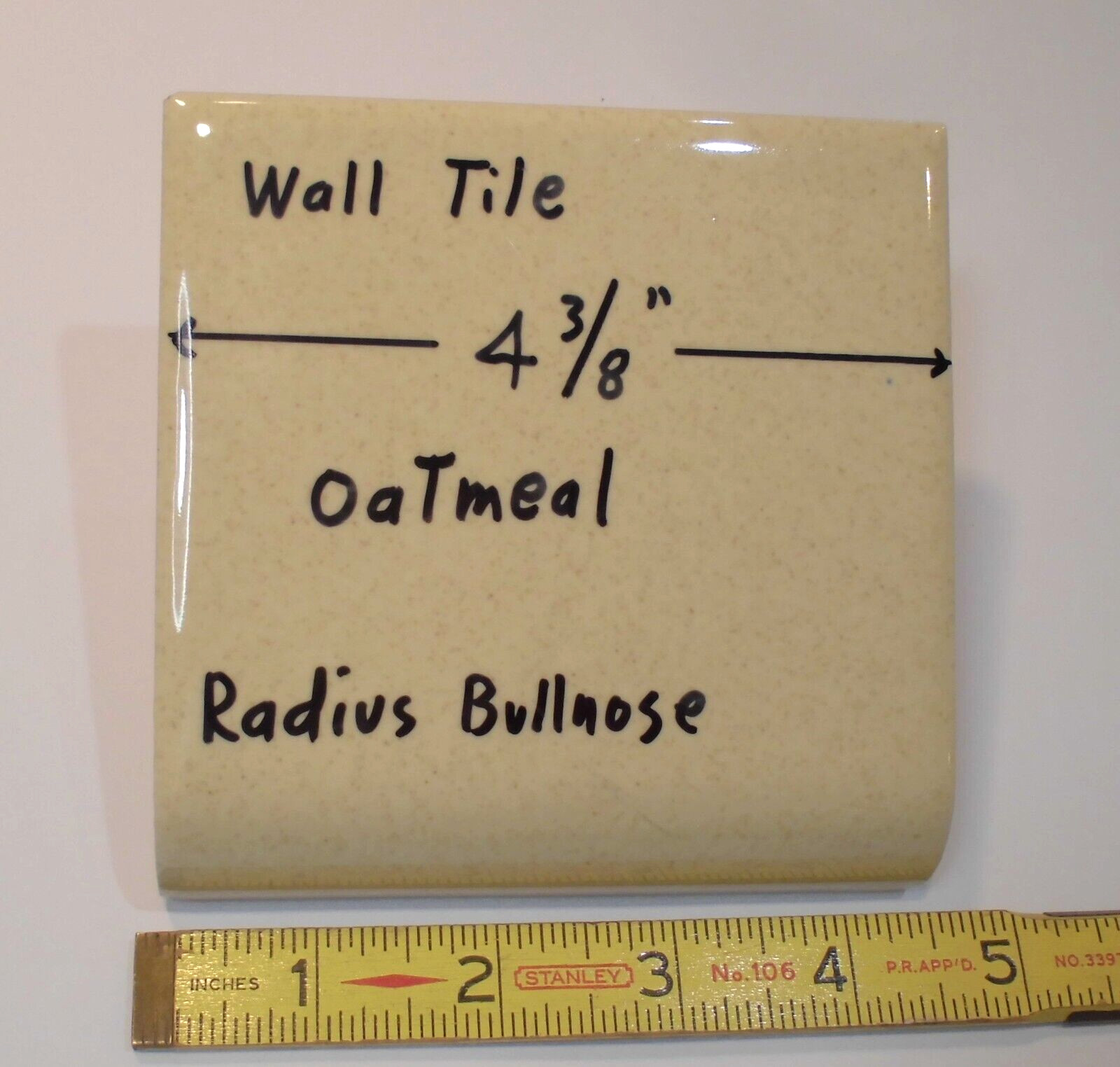 1 pc. Oatmeal: Glossy Ceramic Radius Bullnose tile 4-3/8″ Speckled Beige Defects