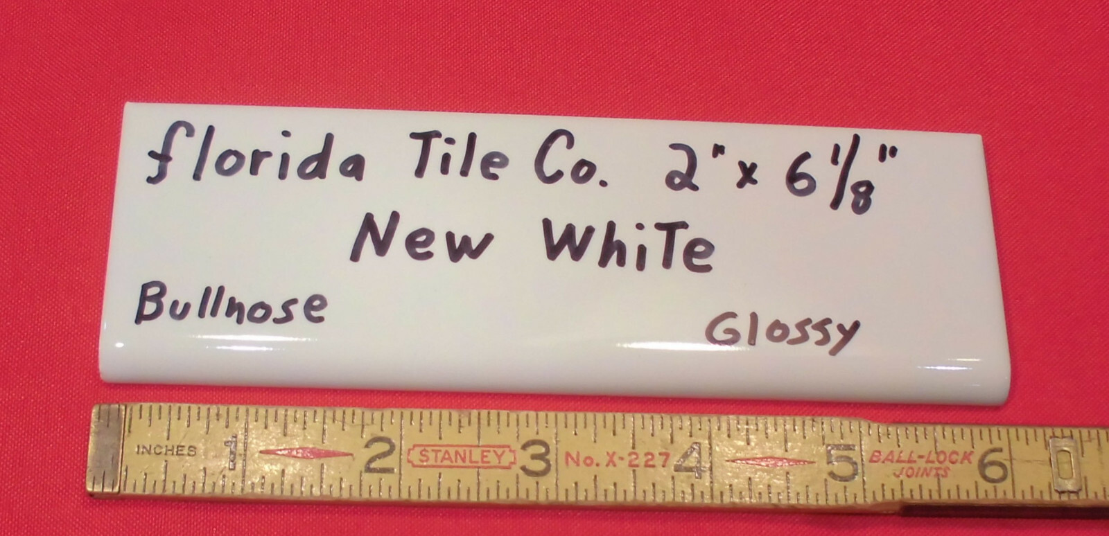 1 pc. Florida Tile Co. *Gloss New White #100* Bullnose Ceramic Tile, flat type