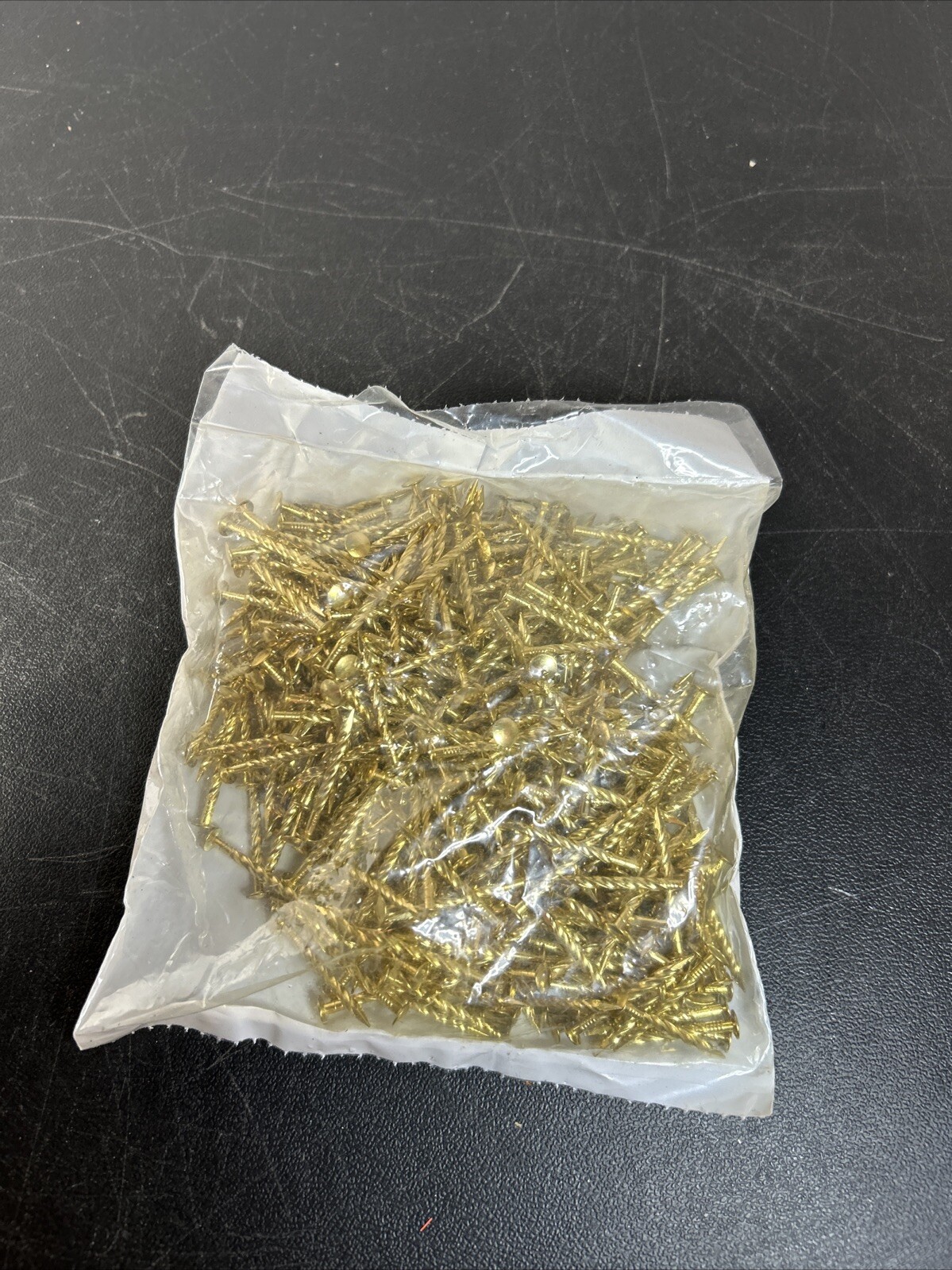 1-1/4″ Brass Coated Gold Screw Nails. 1 Lb Pack