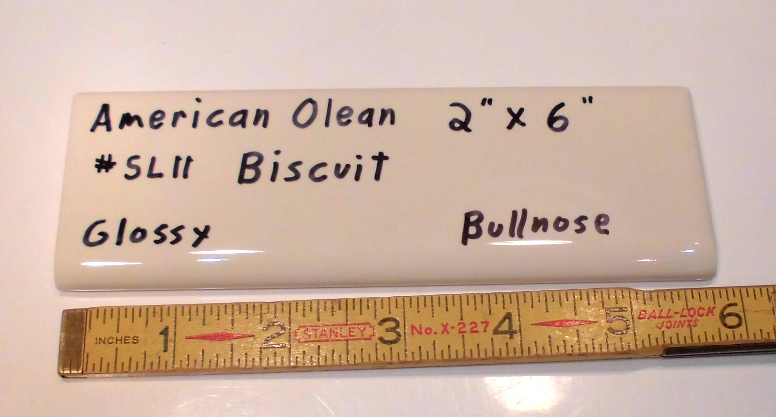 1 pc. Starting Line by American Olean; #SL11 Gloss Biscuit Bullnose Ceramic Tile