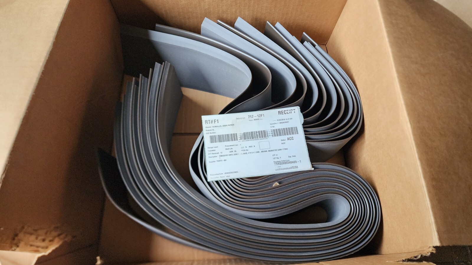 LOT OF 12) 4″ X 4′ VINYL WALL BASE BROWN