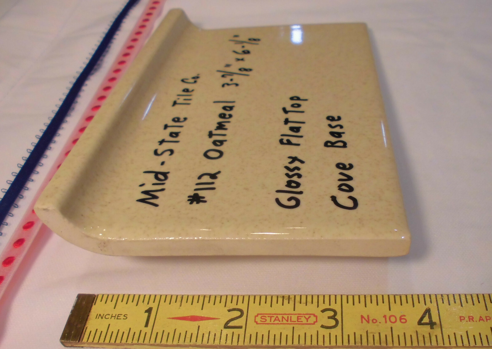 1 pc. Glossy *Oatmeal* 4” X 6” Ceramic Cove Base Tile by Mid-State, flat top