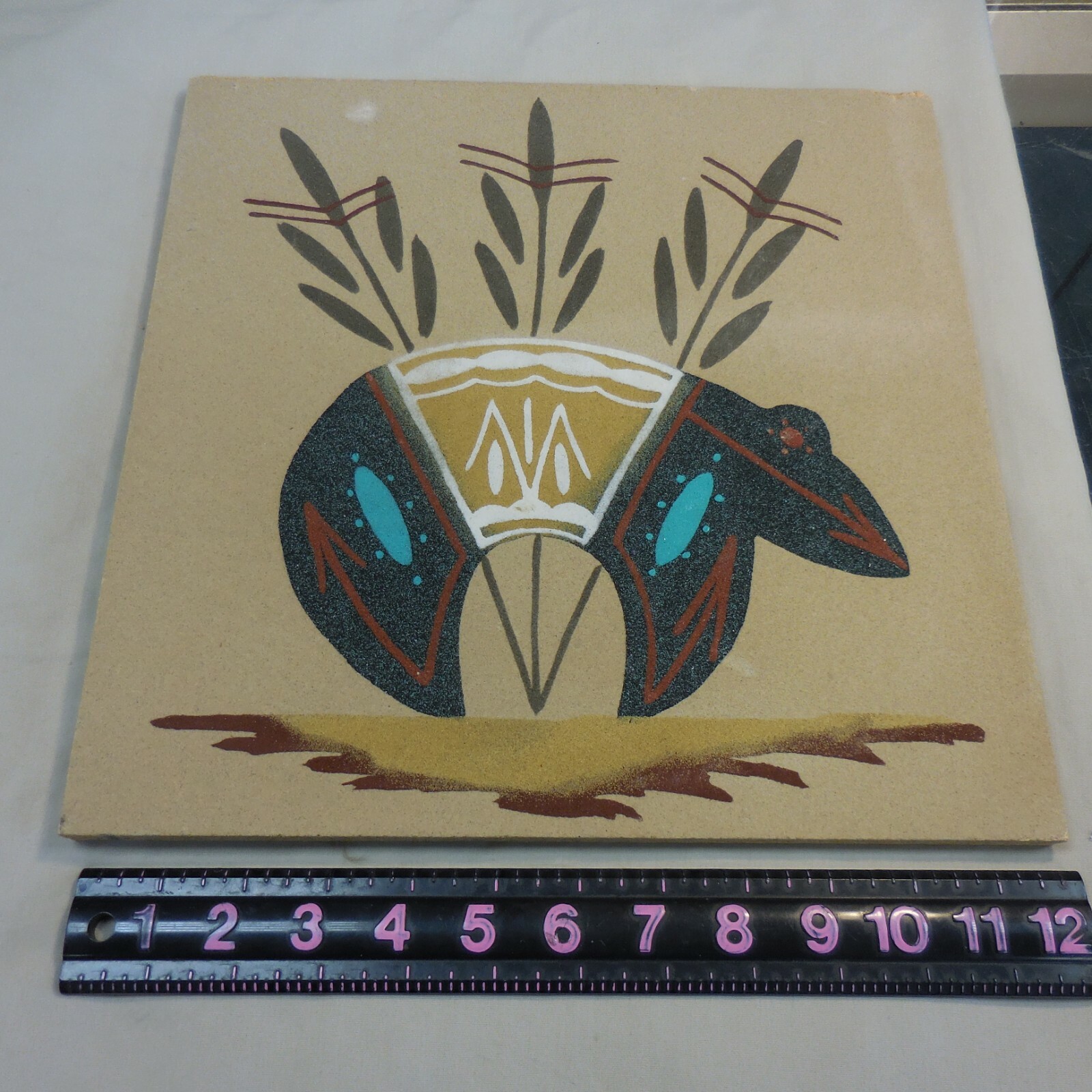 WOODEN BOARD WITH INDIAN PAINTED ARTWORK 12″ X 12″ SIGNED BEAR BRYAN