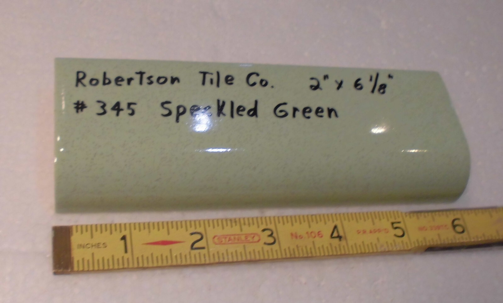 1 pc. Speckled Green: Ceramic Tile; 2″ X 6-1/8″ Radius Bullnose by Robertson Co.
