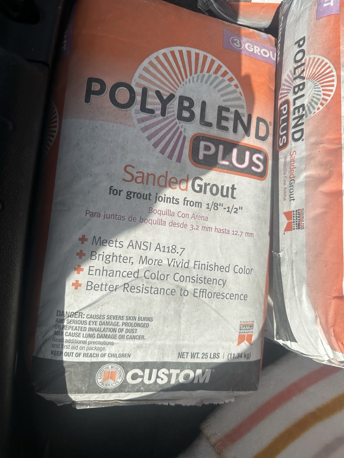 Poly Brand Polyblend Plus Sanded Grout 1/8″-1/2″ Joints 25 lb Gray/White/Orange