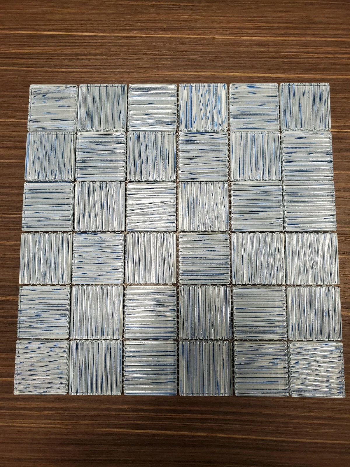 Mirage Series Light Blue 2×2 Glasstile $8 dollars per sheet. 44 sheets available