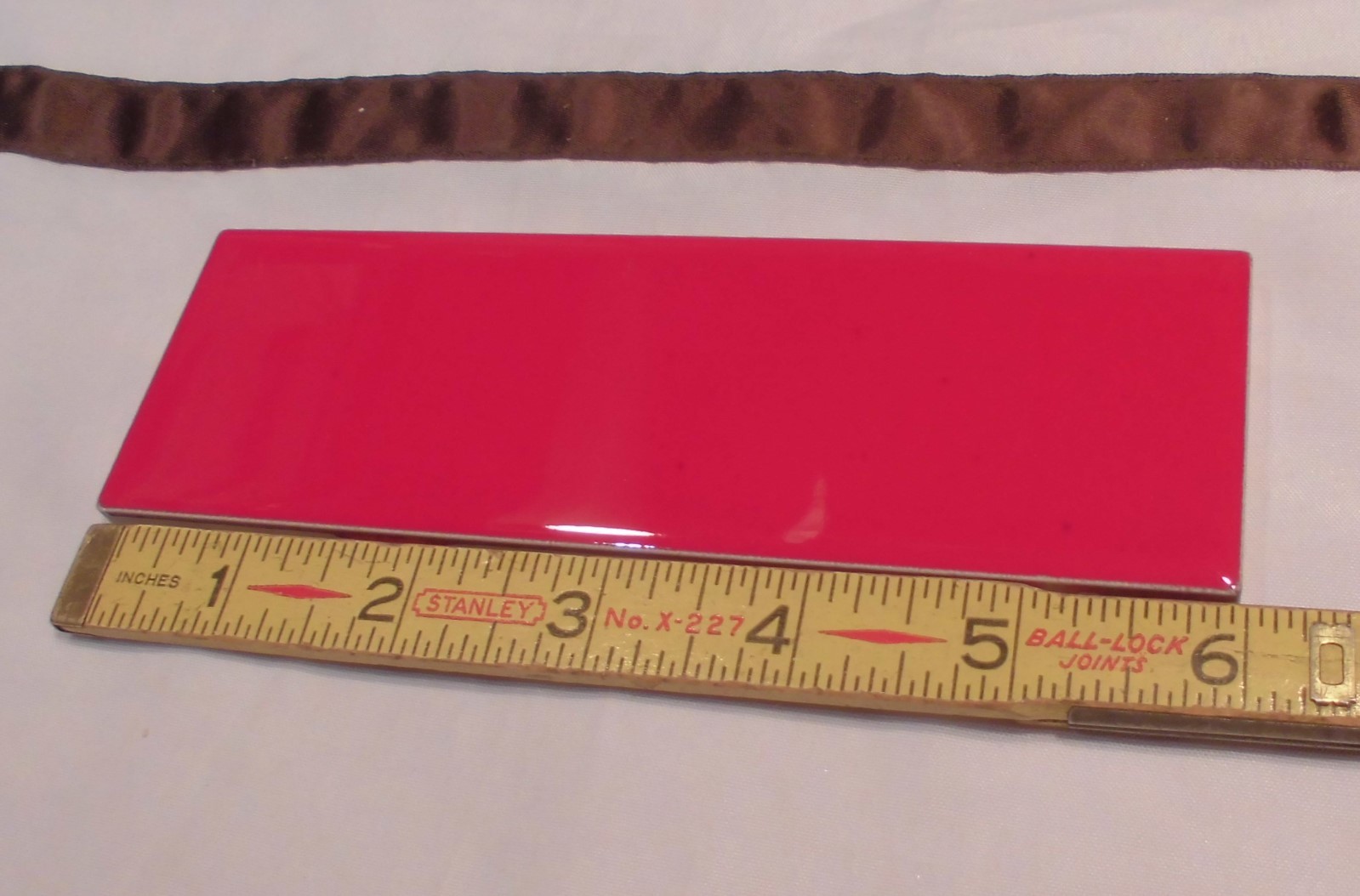 10 pcs. Glossy Ceramic Tiles *Liner/Sizzle *Ruby Red* by American Olean 2″ X 6″