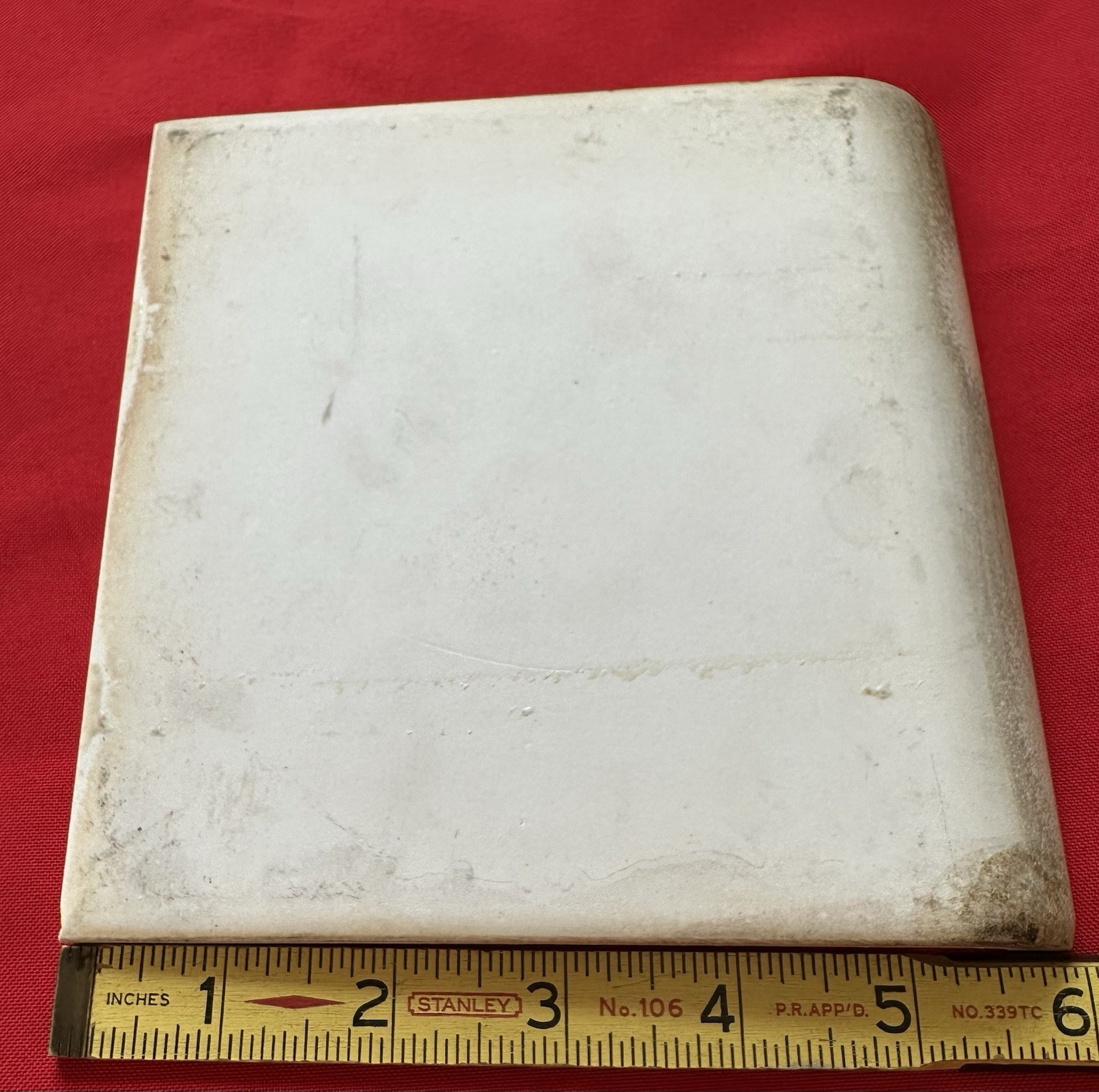 1 pc. Oatmeal Speckled Color: 6” X 6” Glossy Ceramic Cove Base Tile